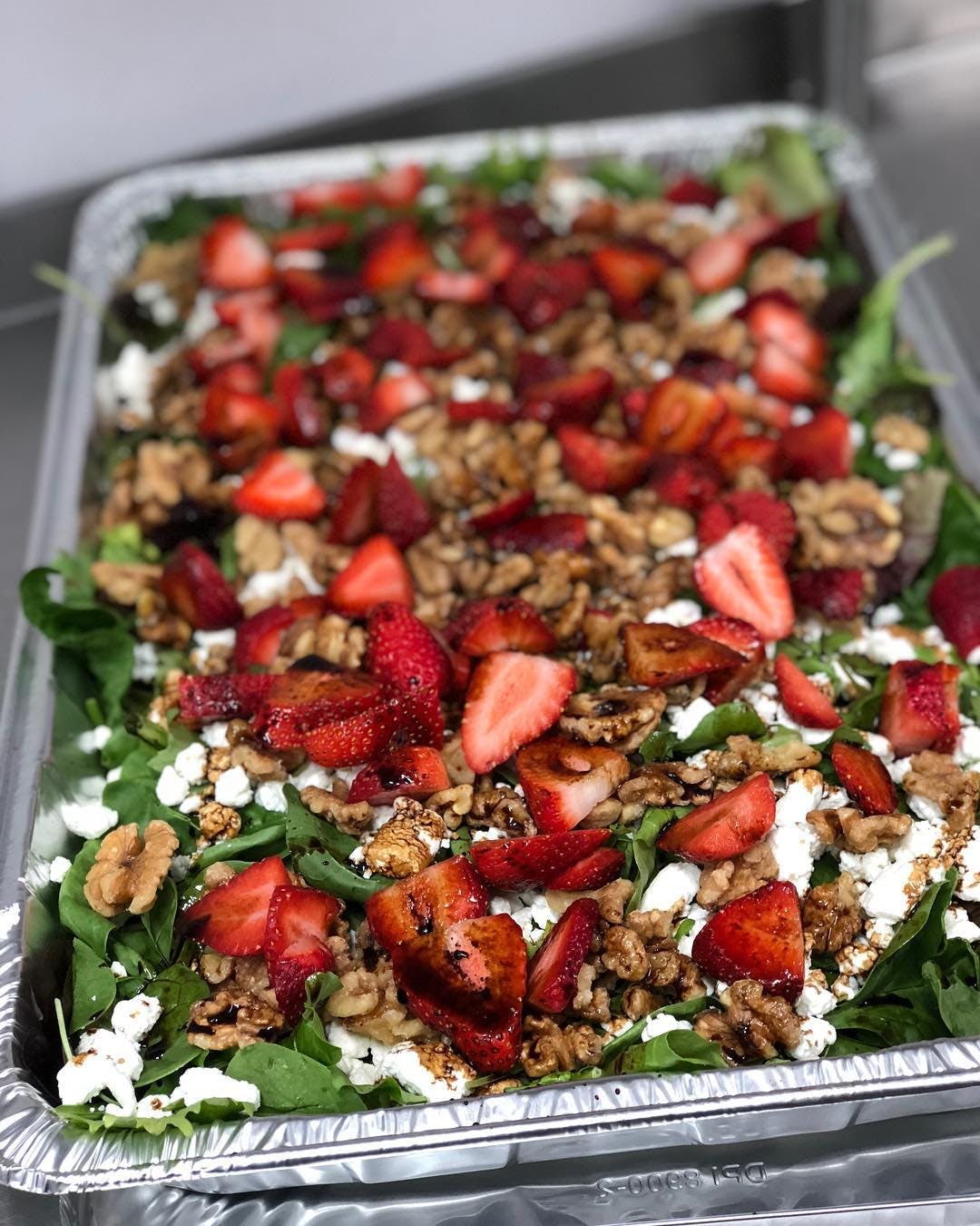 Order Strawberry & Goat Cheese Salad Catering - Half Pan food online from Planet Pizza store, Ridgefield on bringmethat.com