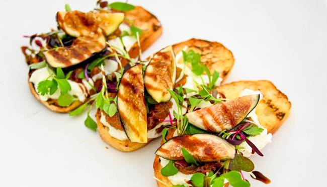 Order Fig Crostini food online from Greenleaf Kitchen And Cocktails store, Costa Mesa on bringmethat.com