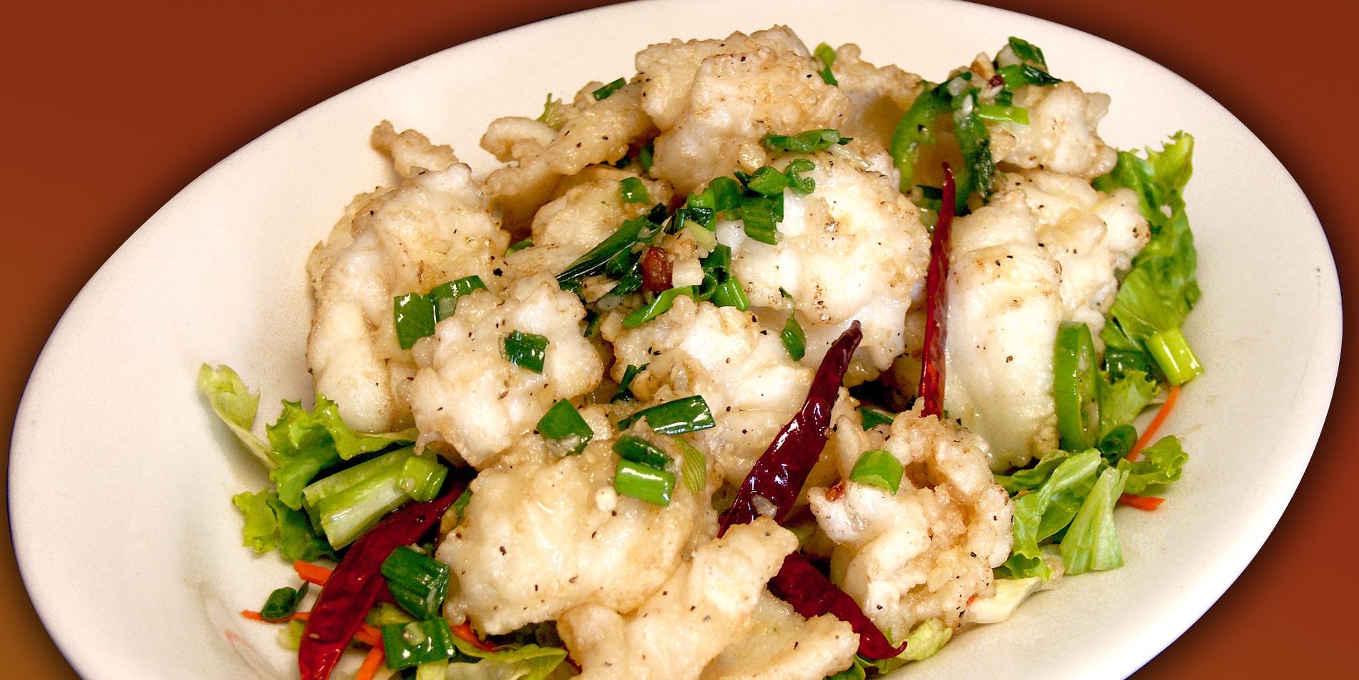 Order Salt and Pepper Calamari food online from Ginger Cafe store, Gilroy on bringmethat.com