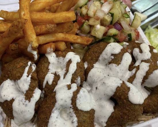 Order Falafel over Rice food online from Halal Munchies store, New York on bringmethat.com