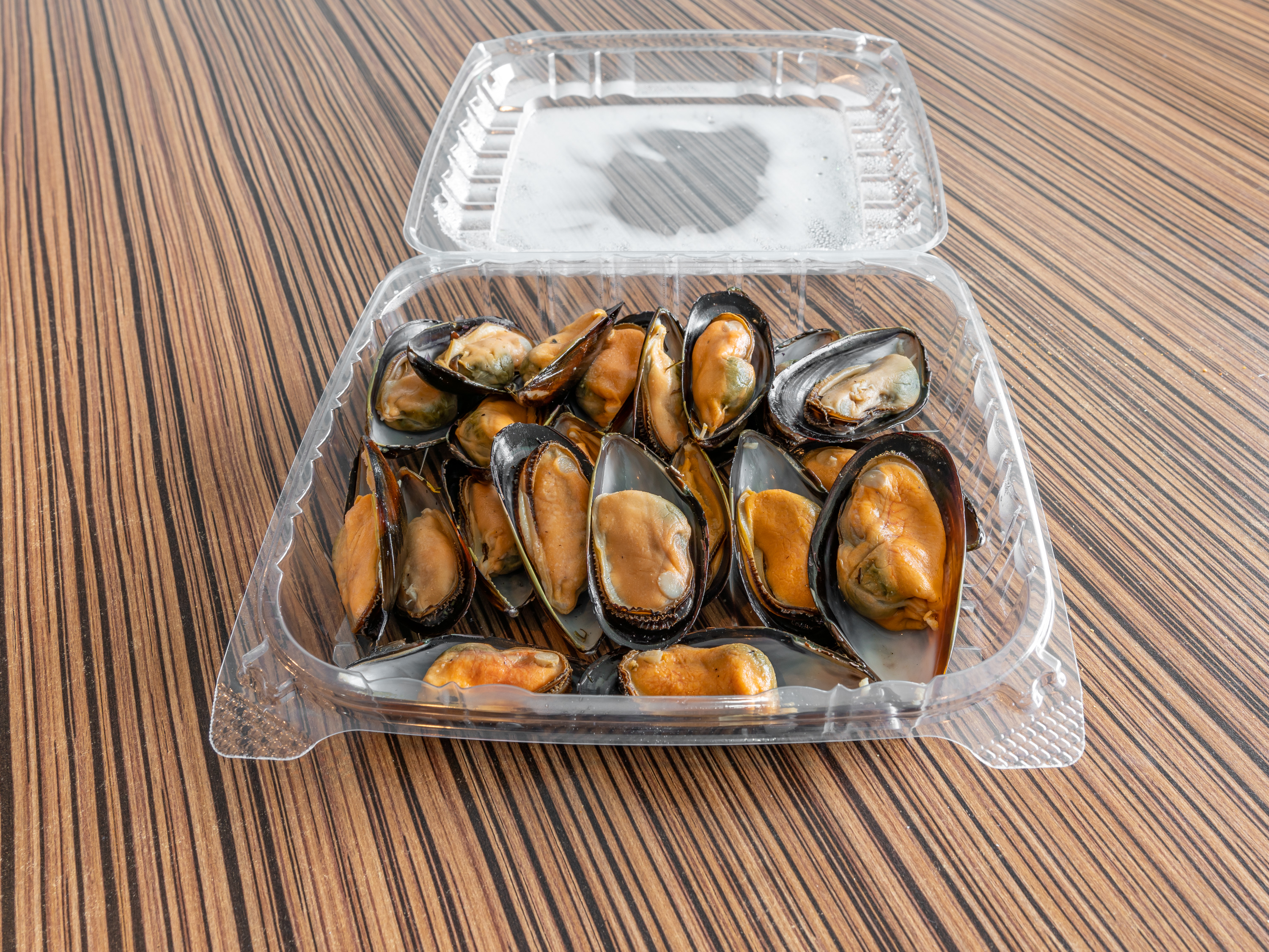 Order Garlic Mussels food online from Ocean Crab House store, Warner Robins on bringmethat.com