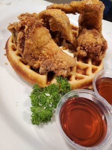 Order 2 Cajun Fried Chicken and Waffle food online from Rhapsody store, Fresno on bringmethat.com
