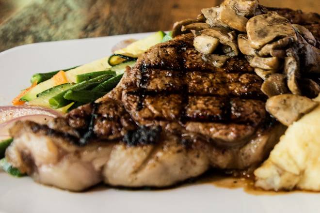 Order 28-Day Aged Ribeye* food online from Carolina Ale House store, Fort Mill on bringmethat.com