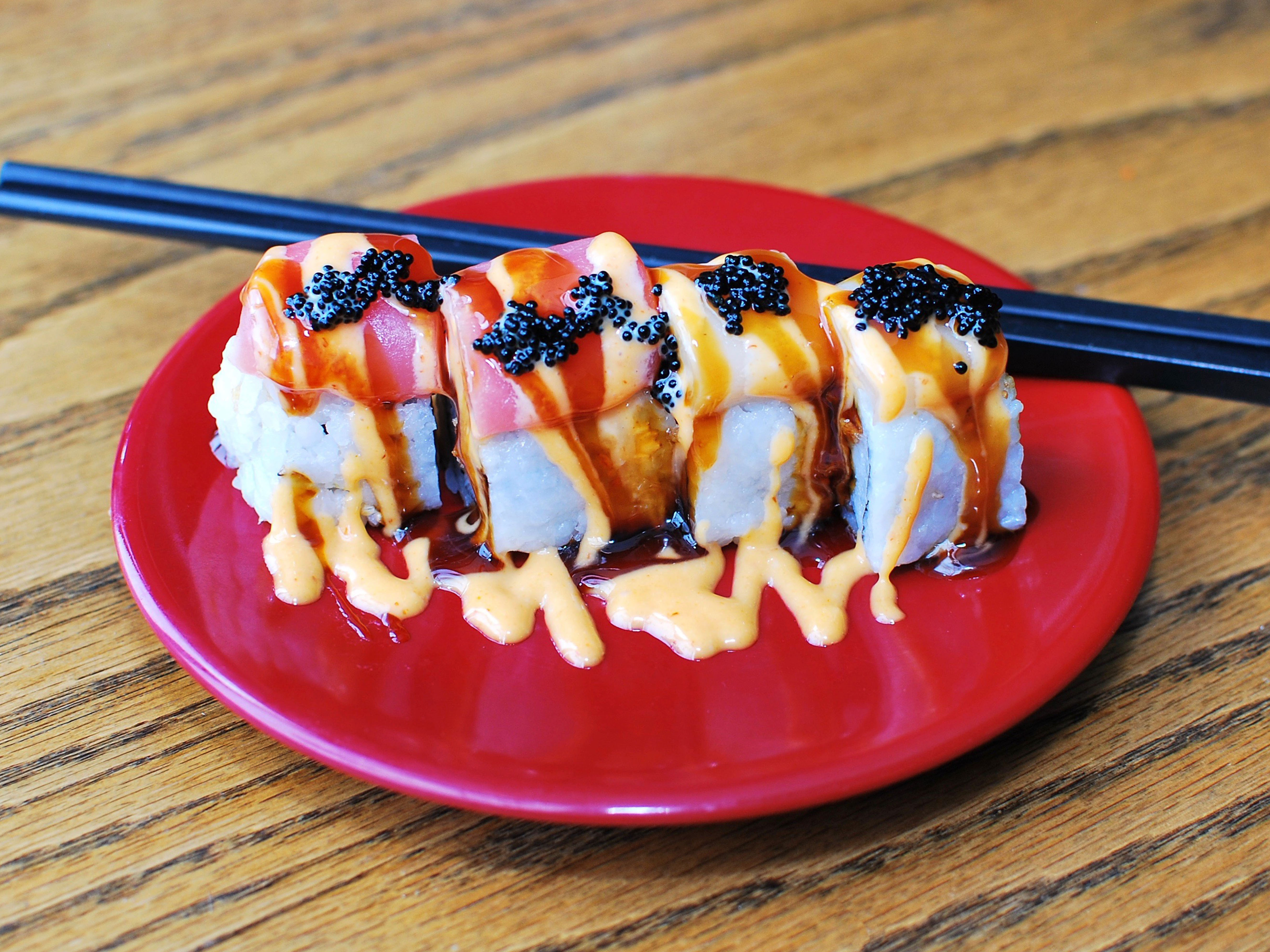 Order 4 Piece Spicy Trio Roll food online from Gorilla Sushi store, Chicago on bringmethat.com