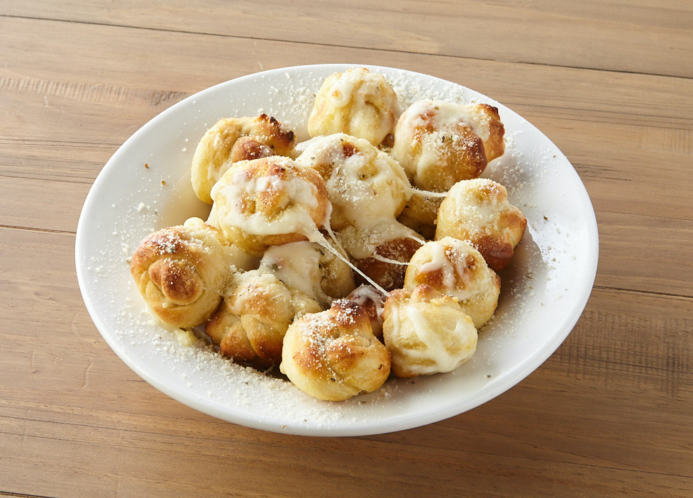Order Mini Garlic Knots with Cheese food online from Johnny Pizza store, Douglasville on bringmethat.com