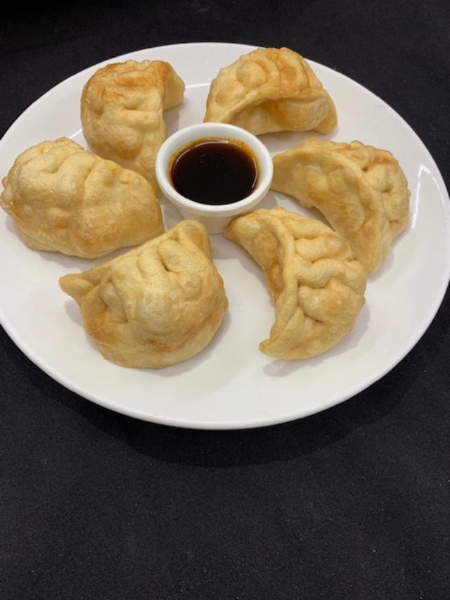 Order 6 Piece Pot Sticker food online from South North Dragon Chinese Restaurant store, Antioch on bringmethat.com