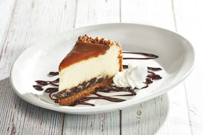 Order TURTLE CHEESECAKE food online from Glory Days Grill store, Brentsville on bringmethat.com