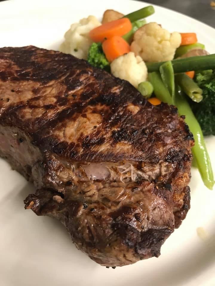 Order NY Strip Steak Special - Dinner food online from Dante's Place store, Leonia on bringmethat.com