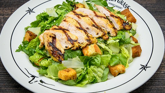 Order Chicken Caesar Salad food online from Saltgrass Steak House store, Houston on bringmethat.com