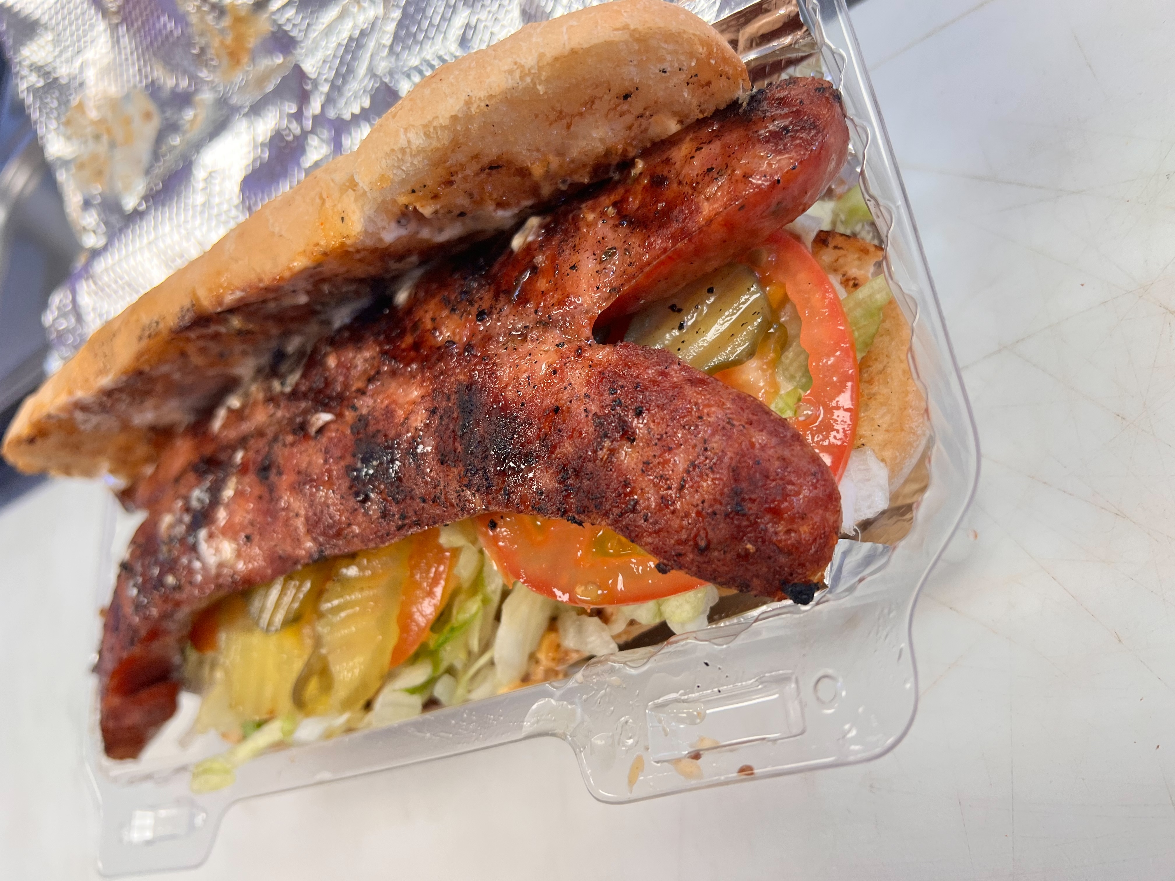 Order Po Boy Hot Sausage food online from Cajun Country Cafe store, Oxnard on bringmethat.com