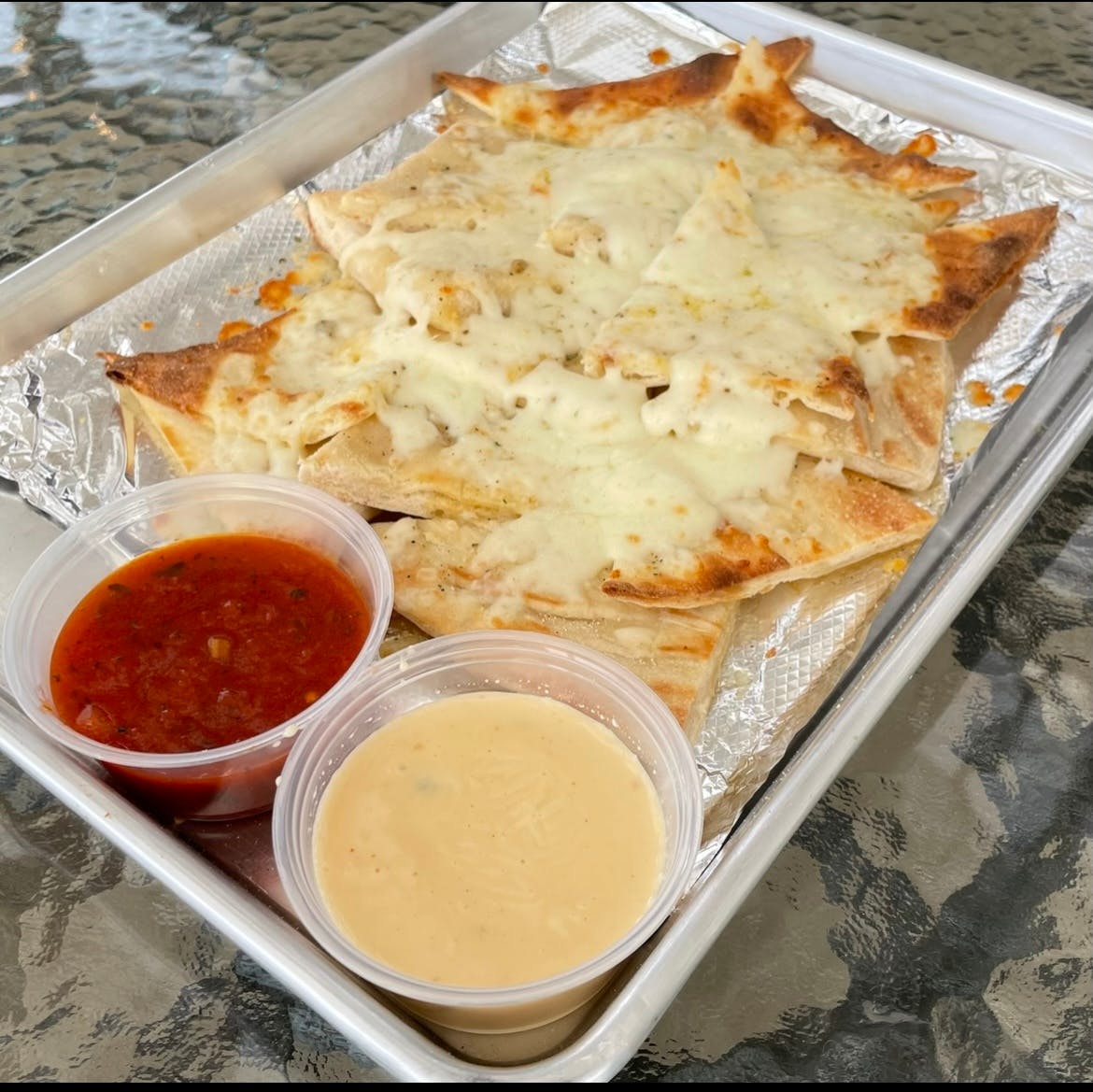 Order Chips & Queso - Fire Starters food online from Camp Fire Pizza store, Jonesboro on bringmethat.com