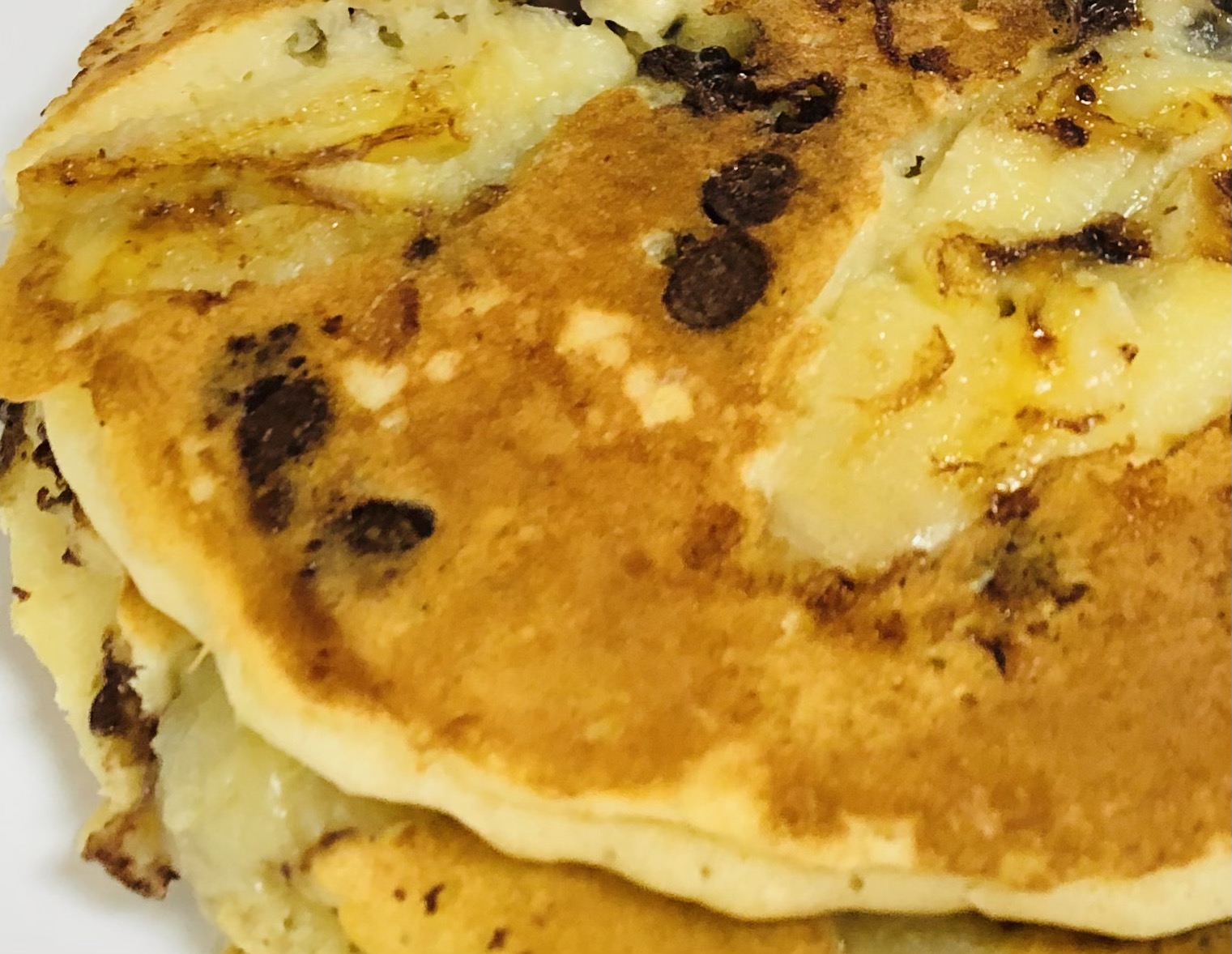 Order Banana Chocolate Chip Pancakes food online from Bagels and brew store, Astoria on bringmethat.com