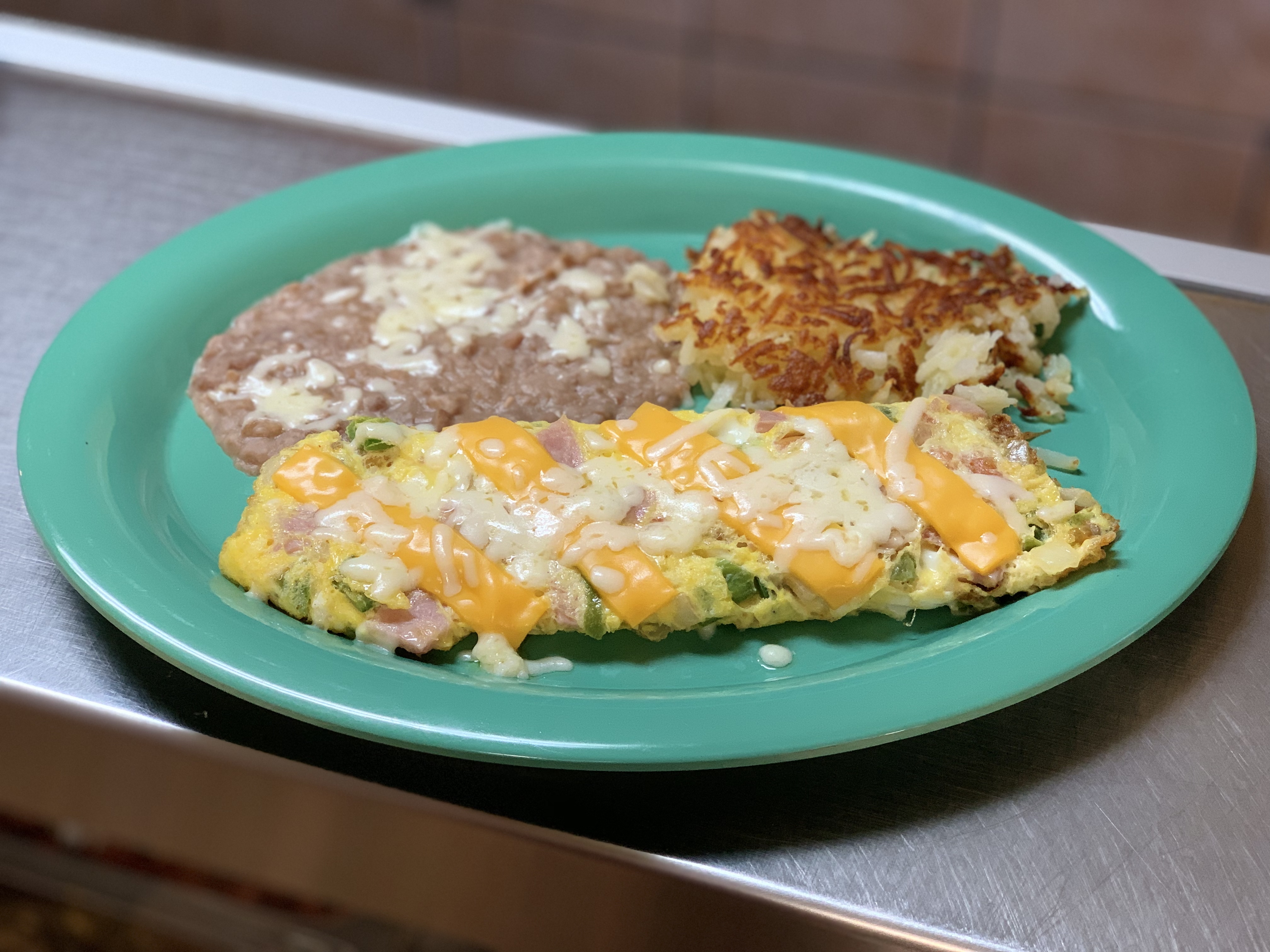 Order Cuauhtemoc Omelette  food online from Cuauhtemoc Cafe store, El Paso on bringmethat.com