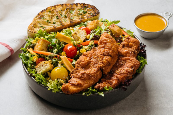 Order Chicken Tender Salad food online from Urban Plates store, Long Beach on bringmethat.com