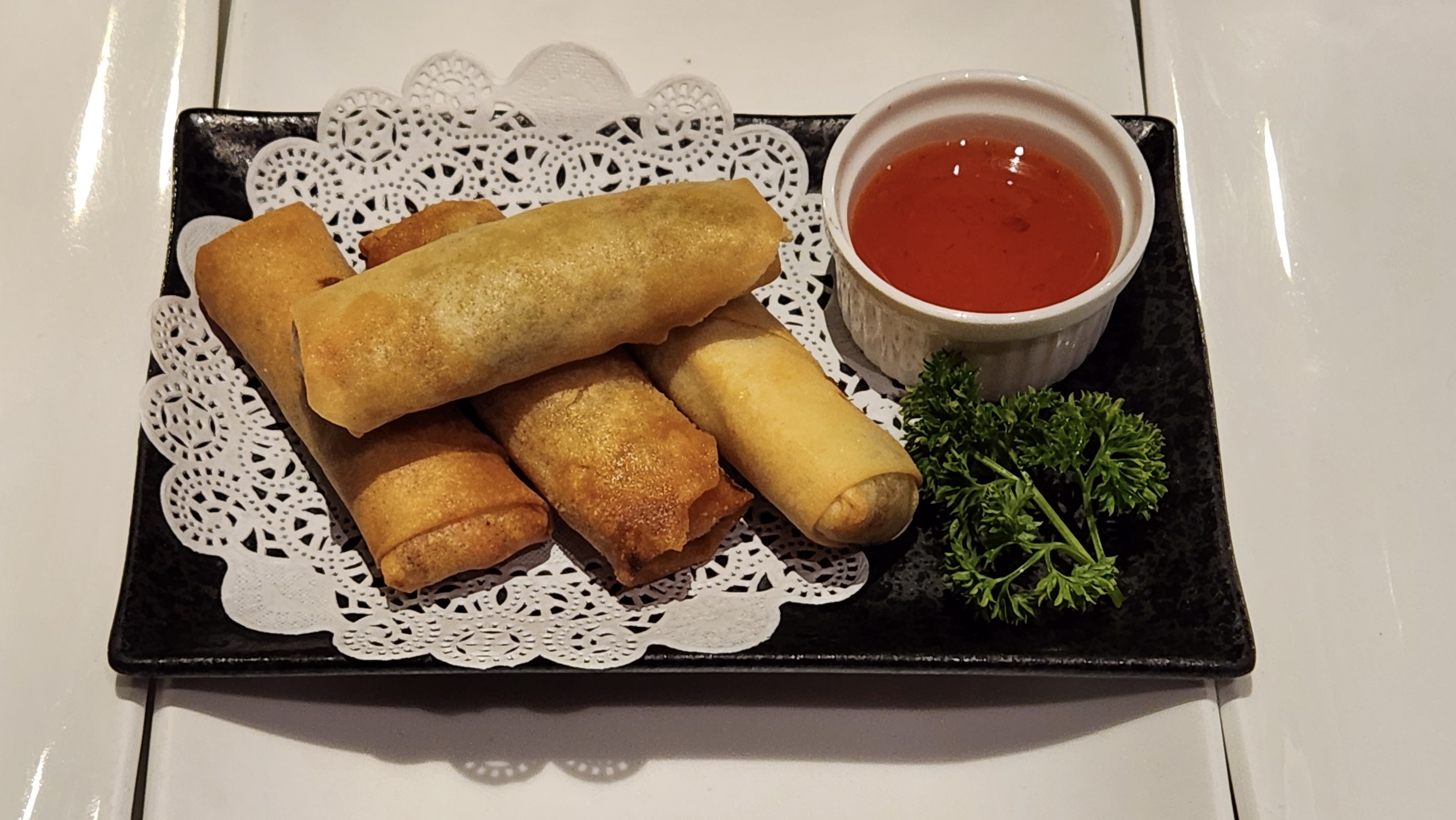 Order Fried Spring Rolls ( 4 Pieces of medium size ) food online from Tsui Sushi Bar store, Seattle on bringmethat.com