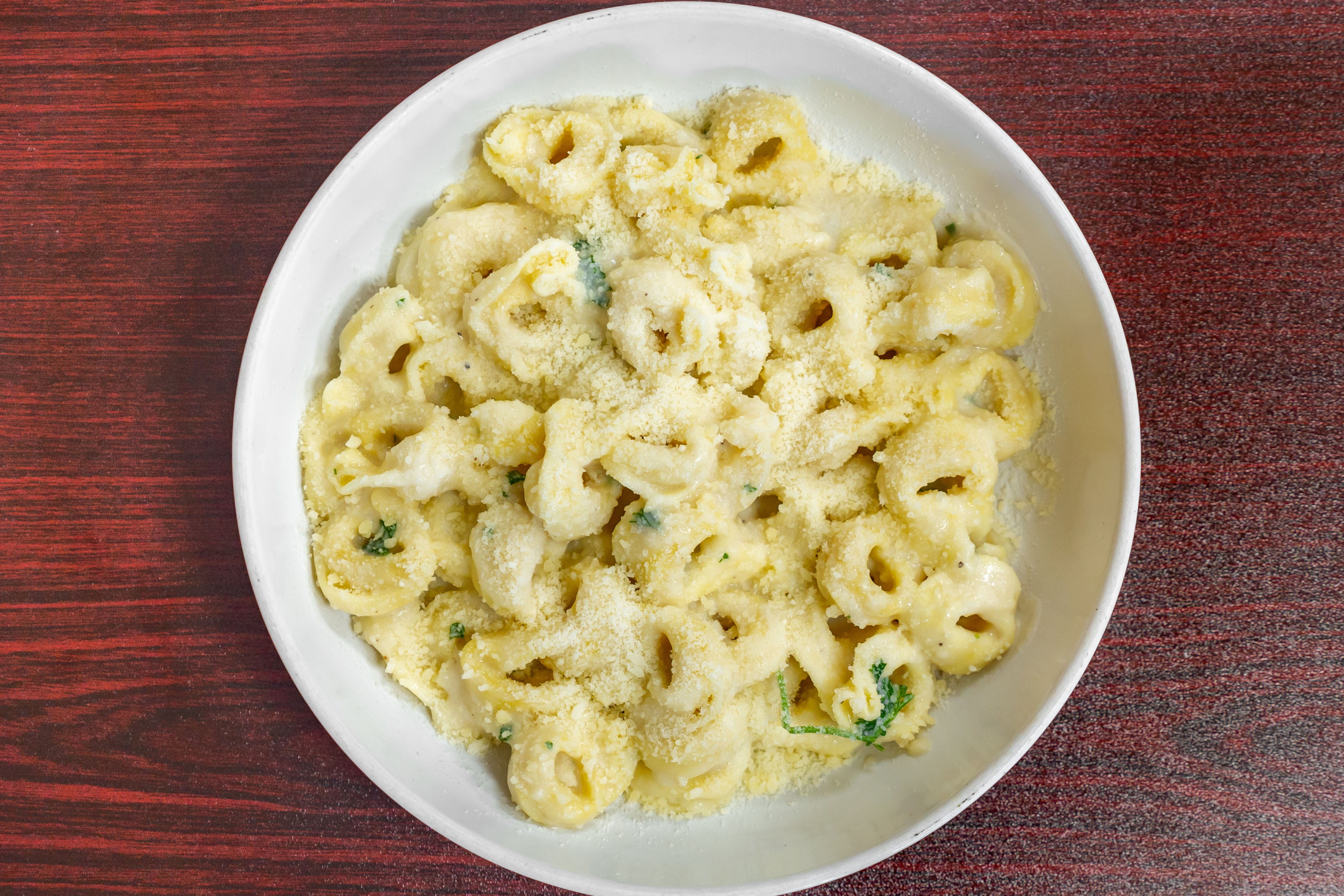Order Tortelloni - Pasta food online from Bella Roma Pizza store, Livermore on bringmethat.com
