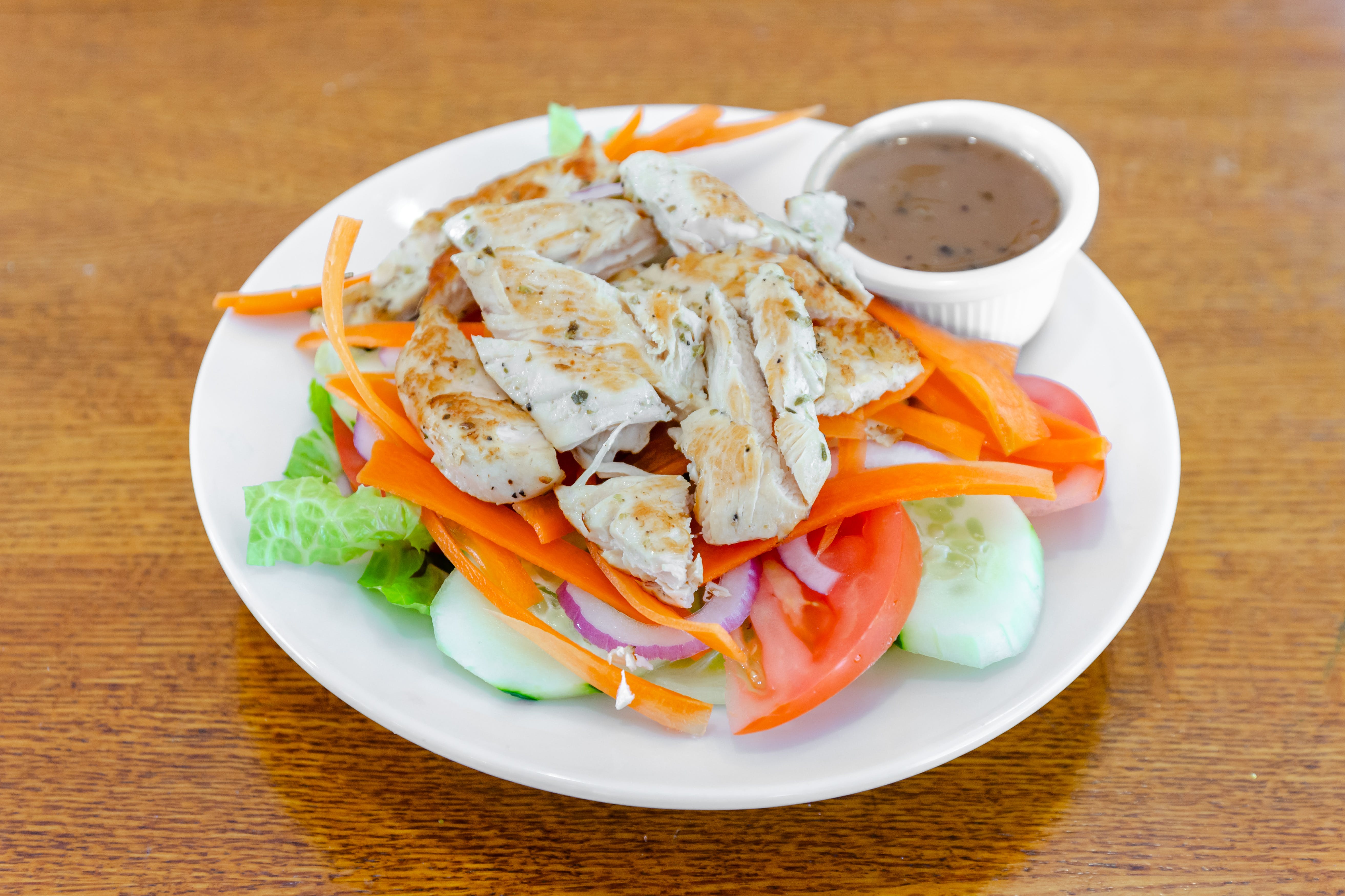 Order Garden Salad with Grilled Chicken - Small food online from Loradella's family pizzeria store, Jersey City on bringmethat.com