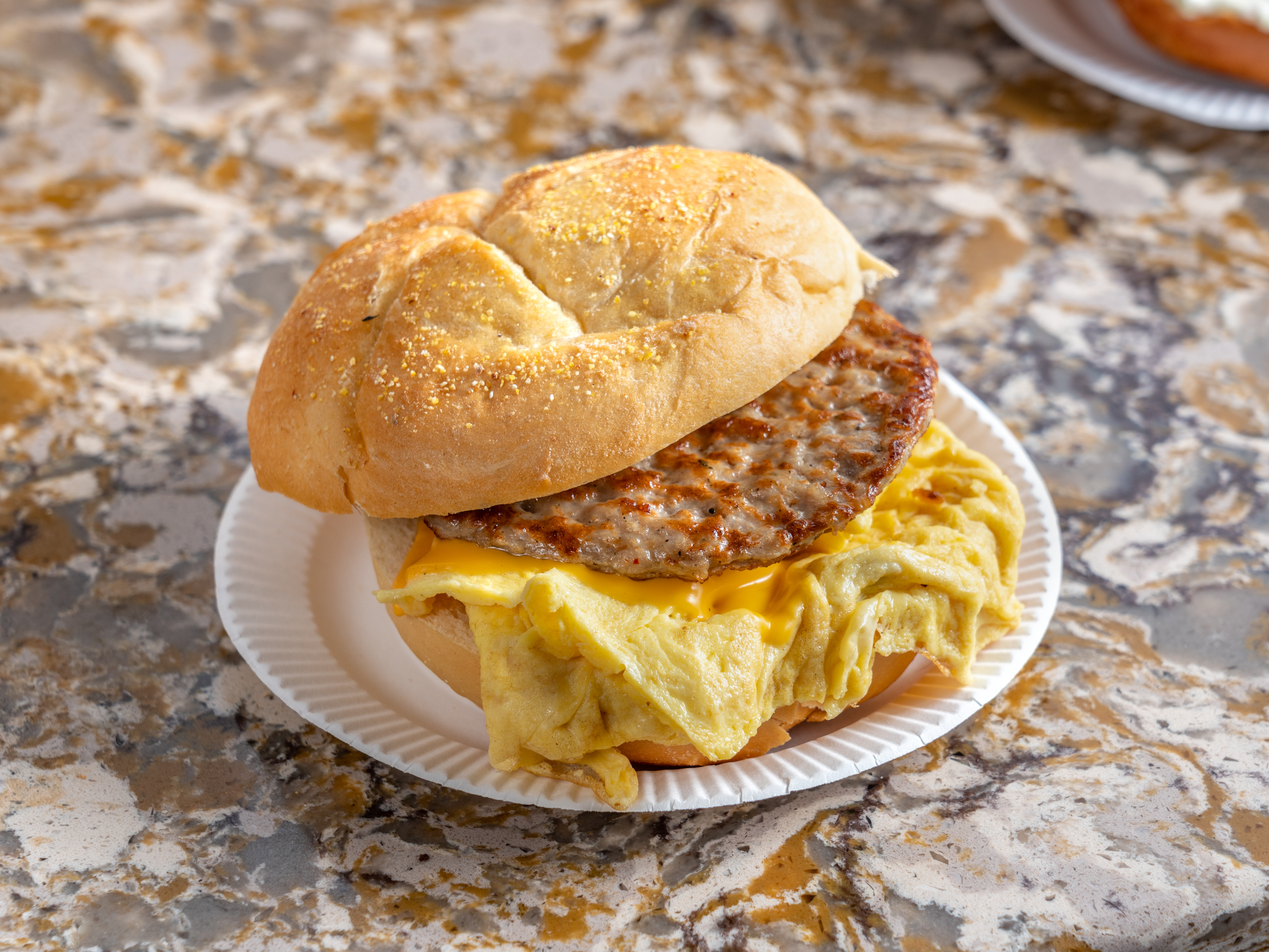 Order Sausage, eggs,cheese omelette  food online from Forest Hills Bagels store, Forest Hills on bringmethat.com