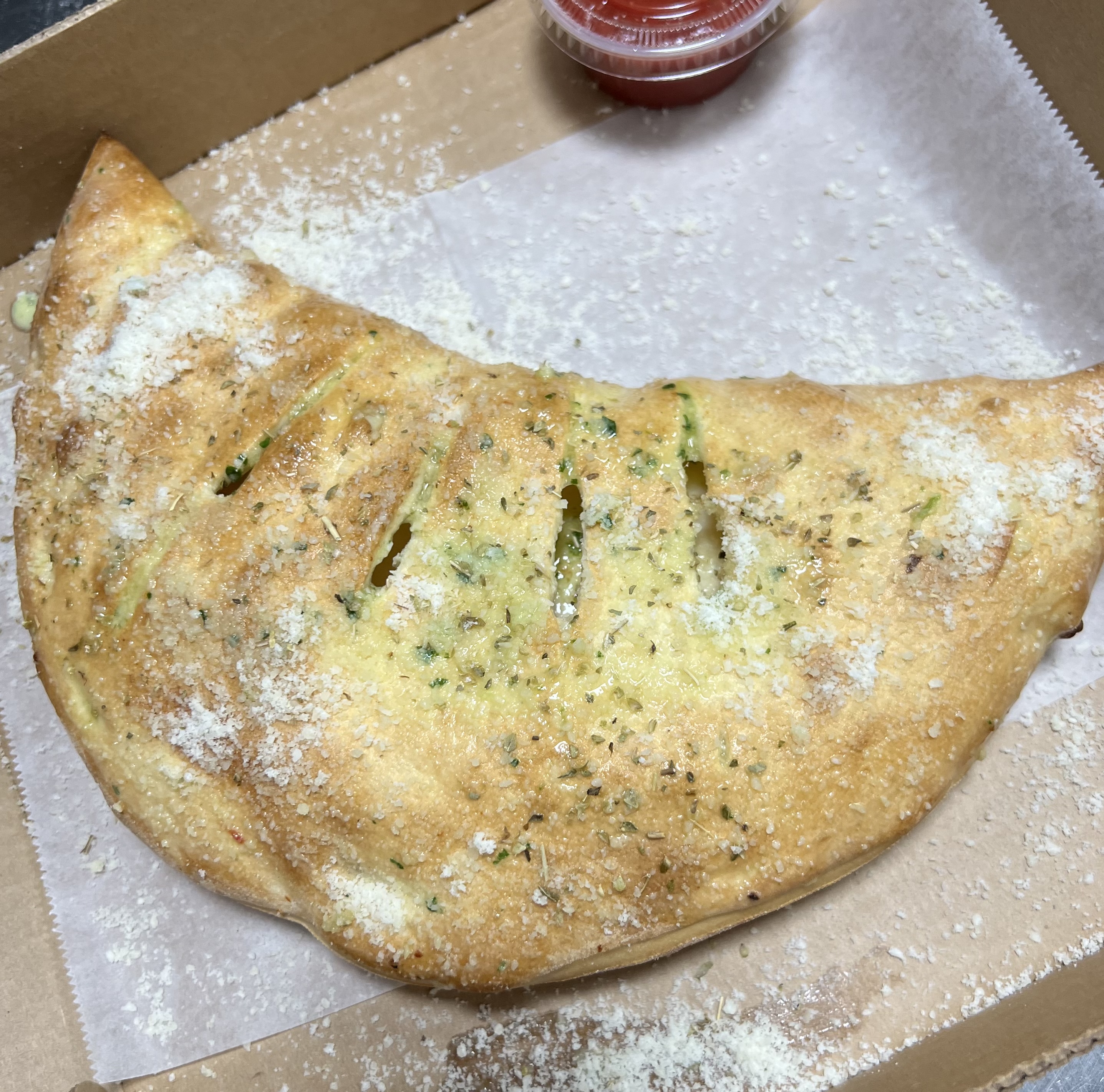 Order Deluxe Calzone food online from Downtown Pizza store, Blacksburg on bringmethat.com