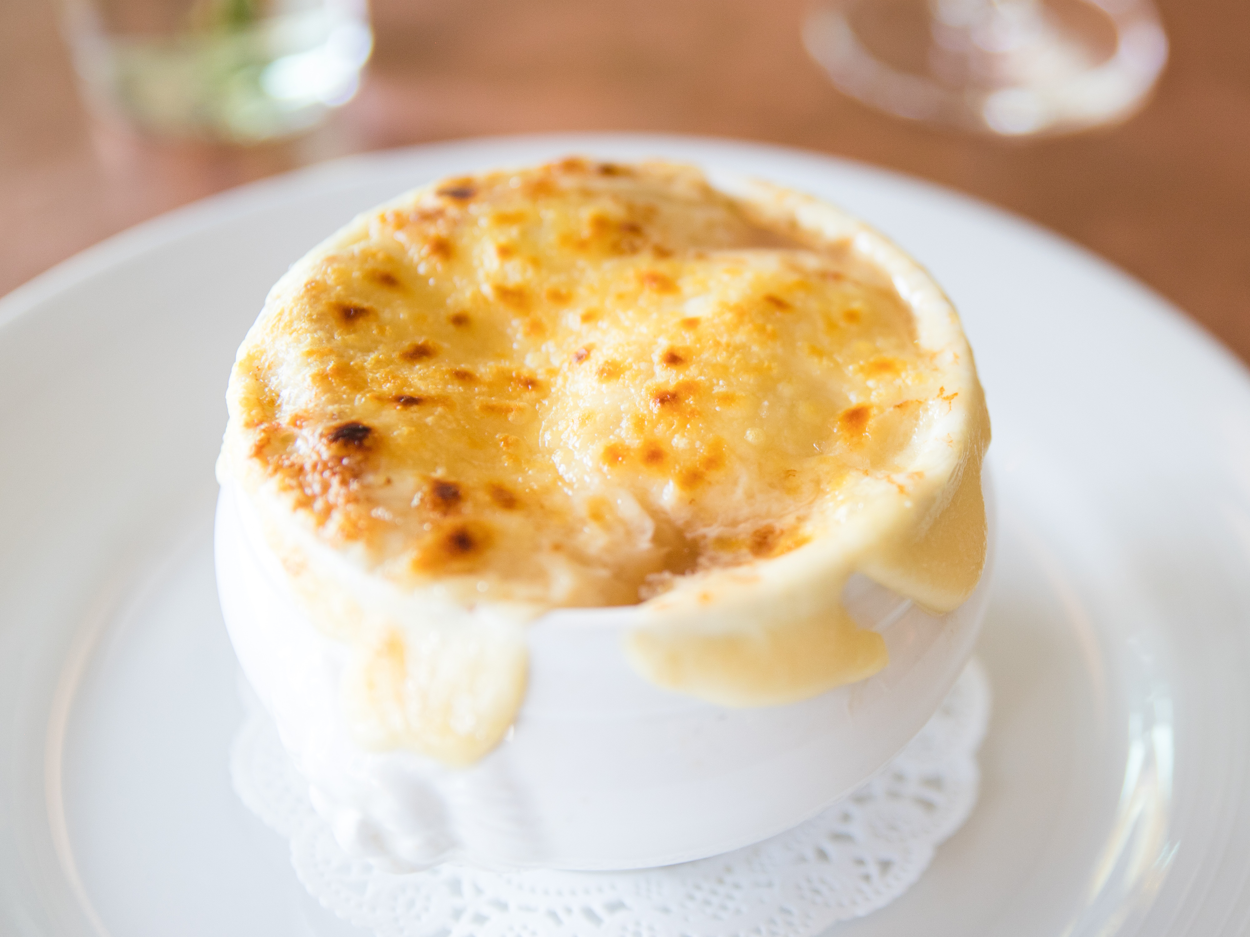 Order French Onion Soup Gratinee food online from Parc Bistro-Brasserie store, San Diego on bringmethat.com