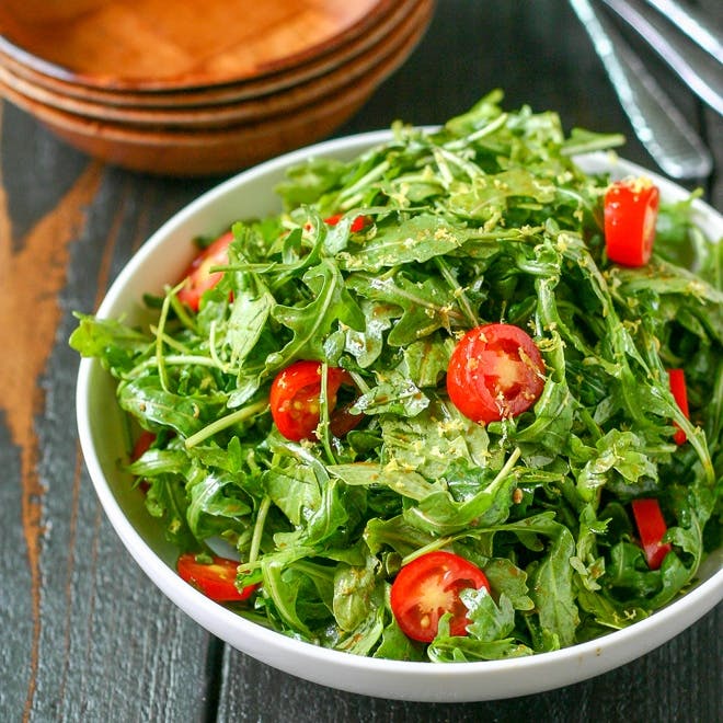 Order Arugula Salad - Salad food online from Top Tomato Bar & Pizza store, Philadelphia on bringmethat.com
