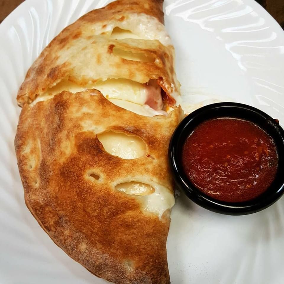 Order Meat Calzone food online from Nostra Pizza store, Greensboro on bringmethat.com