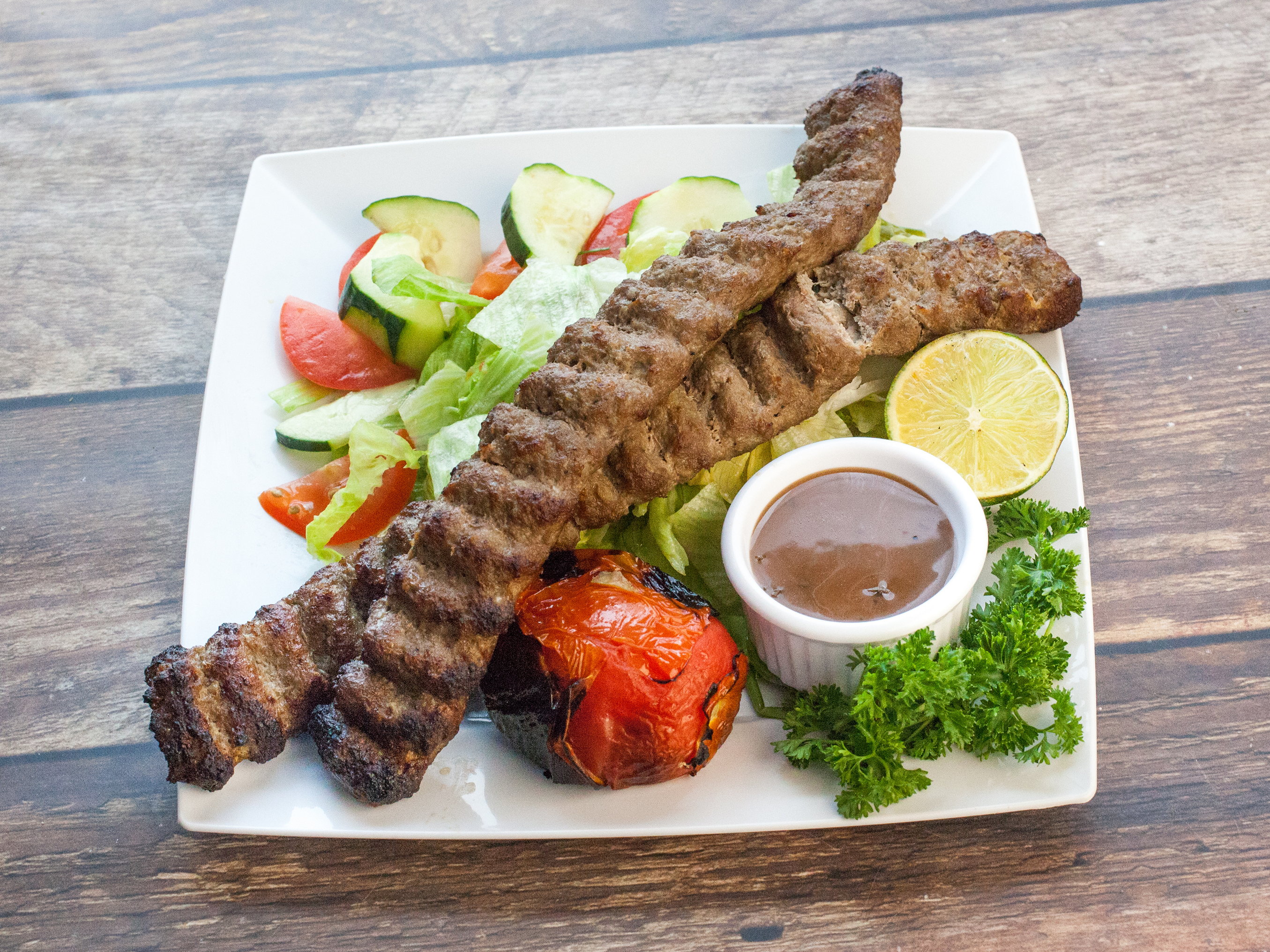 Order Koobideh food online from Persepolis Grill Persian store, Seattle on bringmethat.com