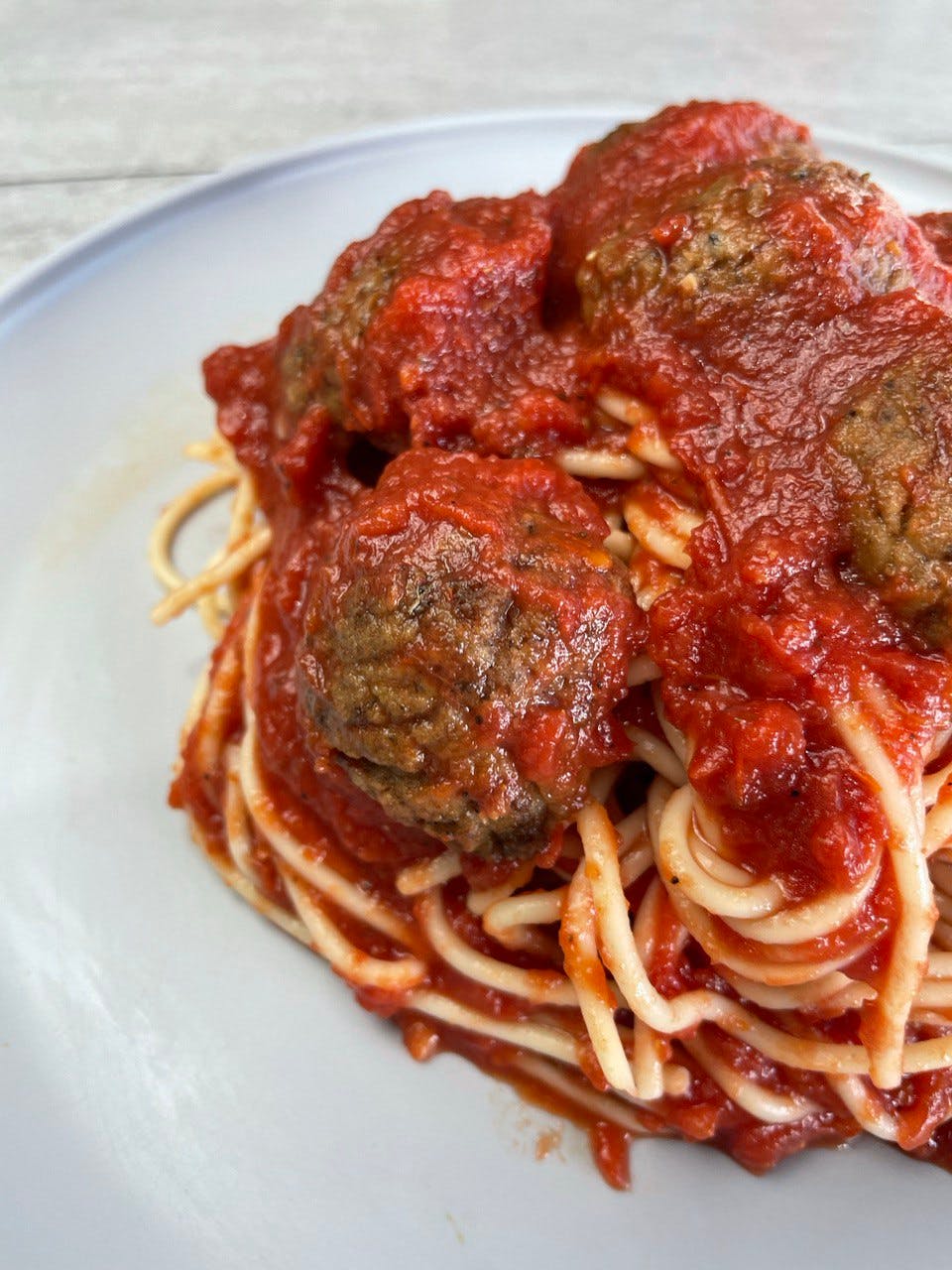 Order Vegan Spaghetti & Meatballs - Pasta food online from Troys Italian Kitchen store, Arlington on bringmethat.com