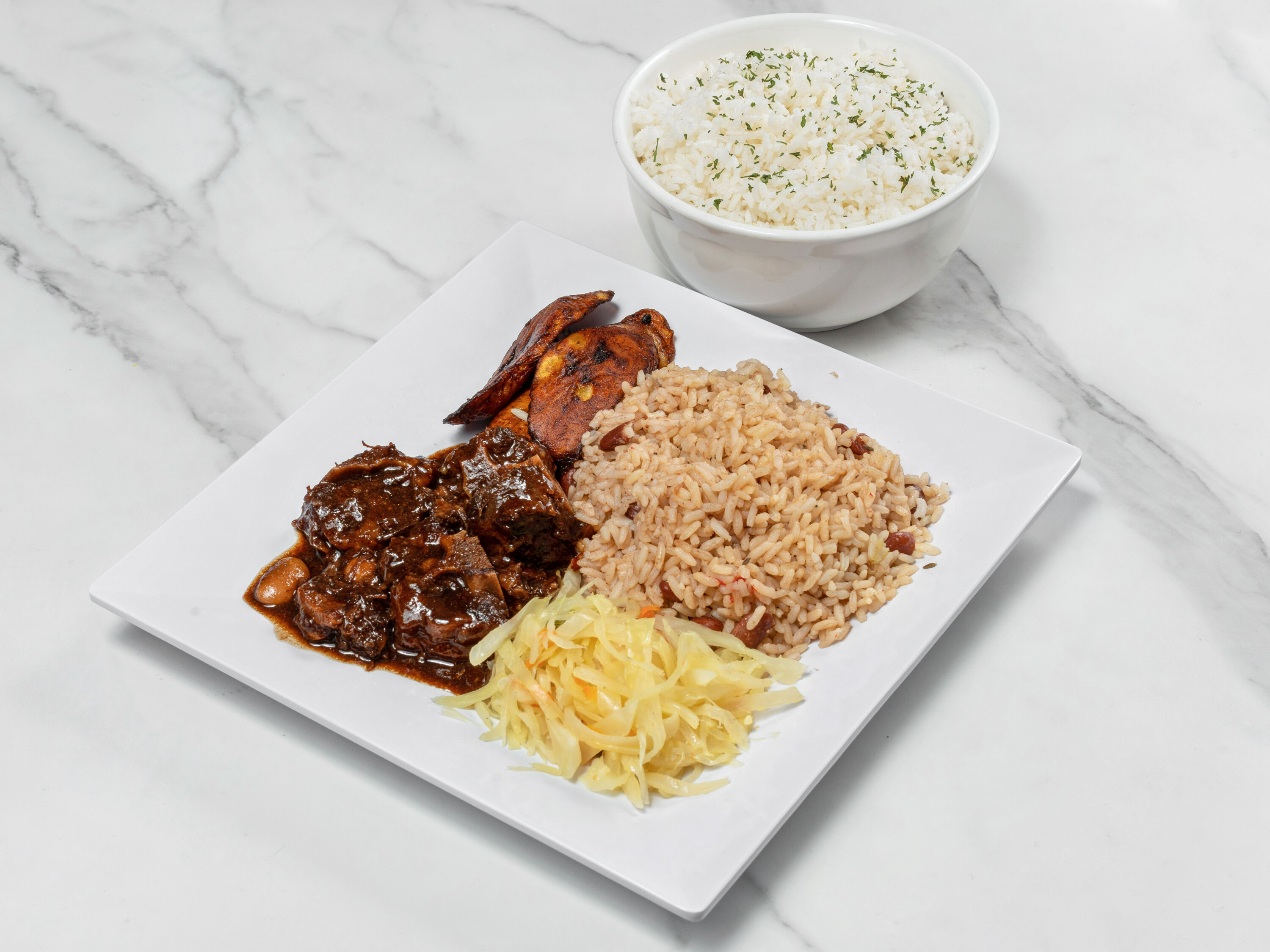 Order Oxtail food online from Culcha Caribbean Cuisine store, Haledon on bringmethat.com