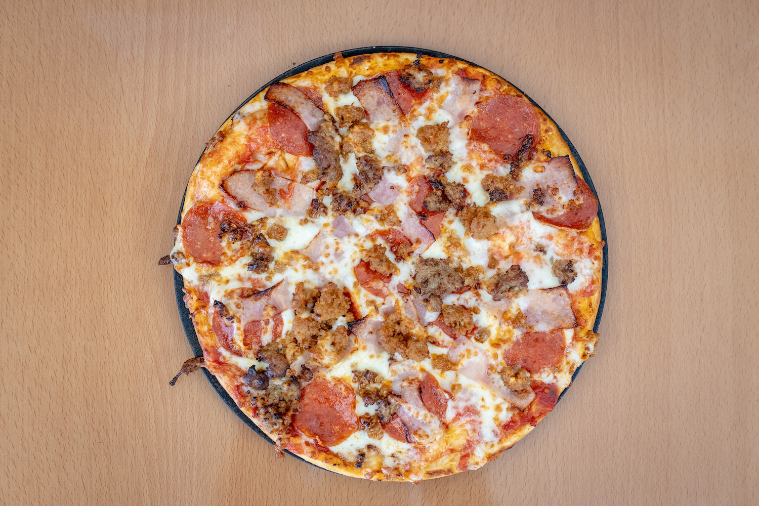 Order All Meat Pizza (10") food online from Pizza Uno store, Raleigh on bringmethat.com