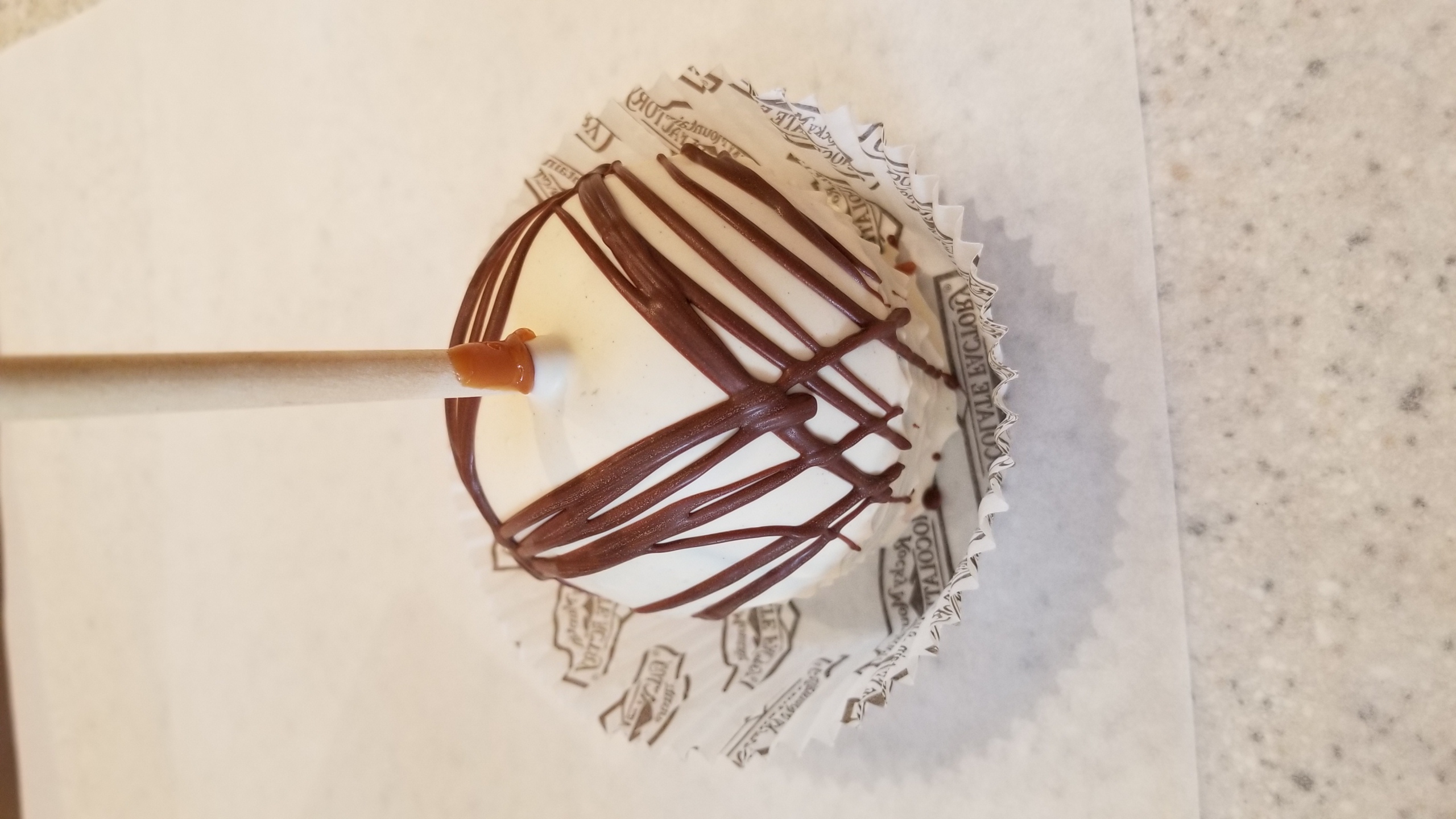 Order Tiger Butter Caramel Apple food online from Rocky Mountain Chocolate Factory store, Tempe on bringmethat.com