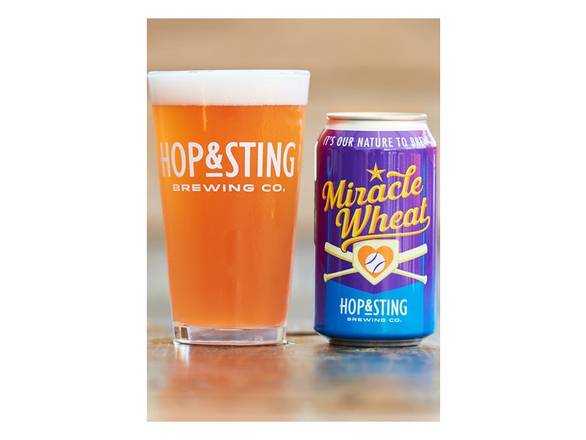 Order Hop & Sting Miracle Wheat - 6x 12oz Cans food online from Bear Creek Spirits & Wine store, Colleyville on bringmethat.com