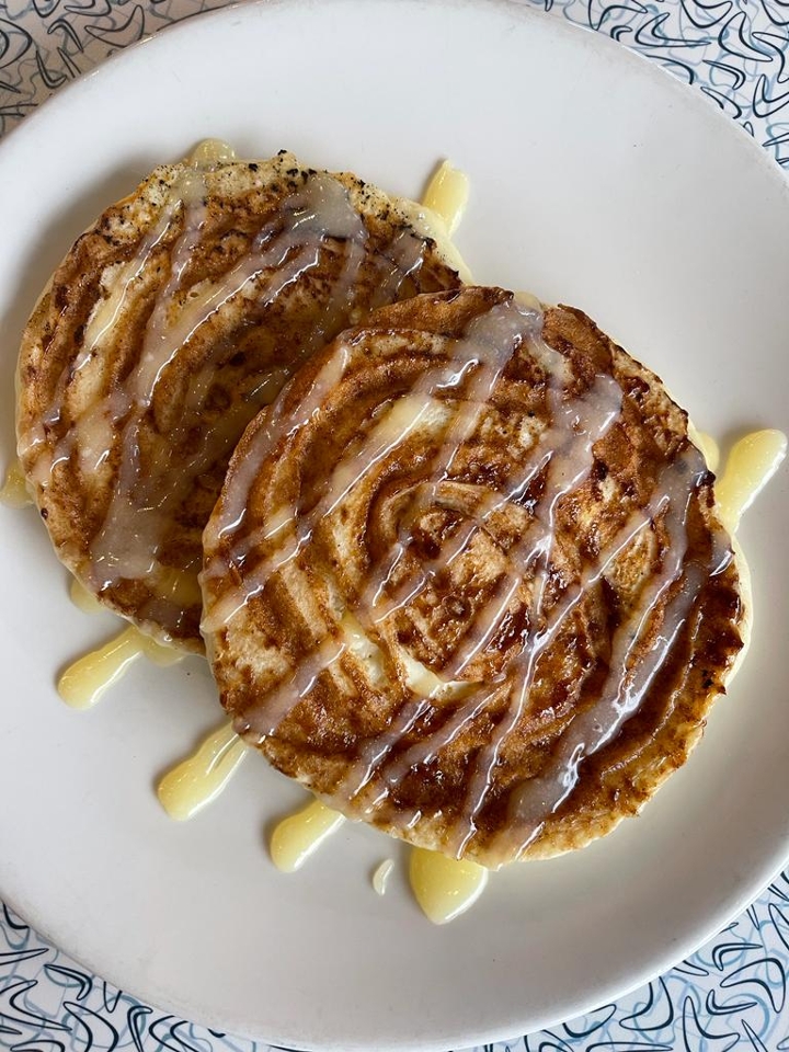 Order Cinnamon Bun Pancakes food online from Central Perk Cafe store, Cedarhurst on bringmethat.com