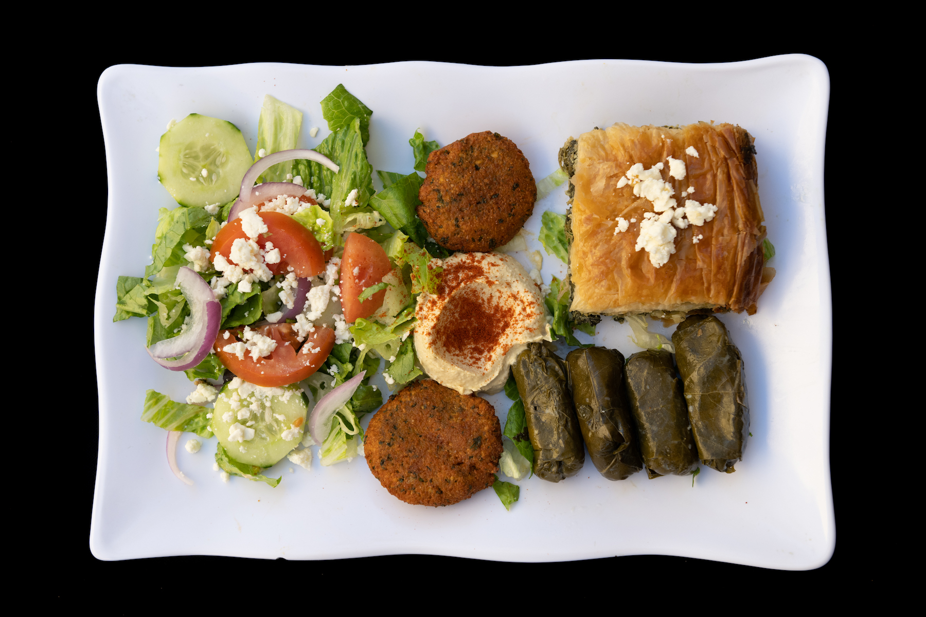 Order Greek Sampler food online from Harbor Greek Cafe store, San Diego on bringmethat.com