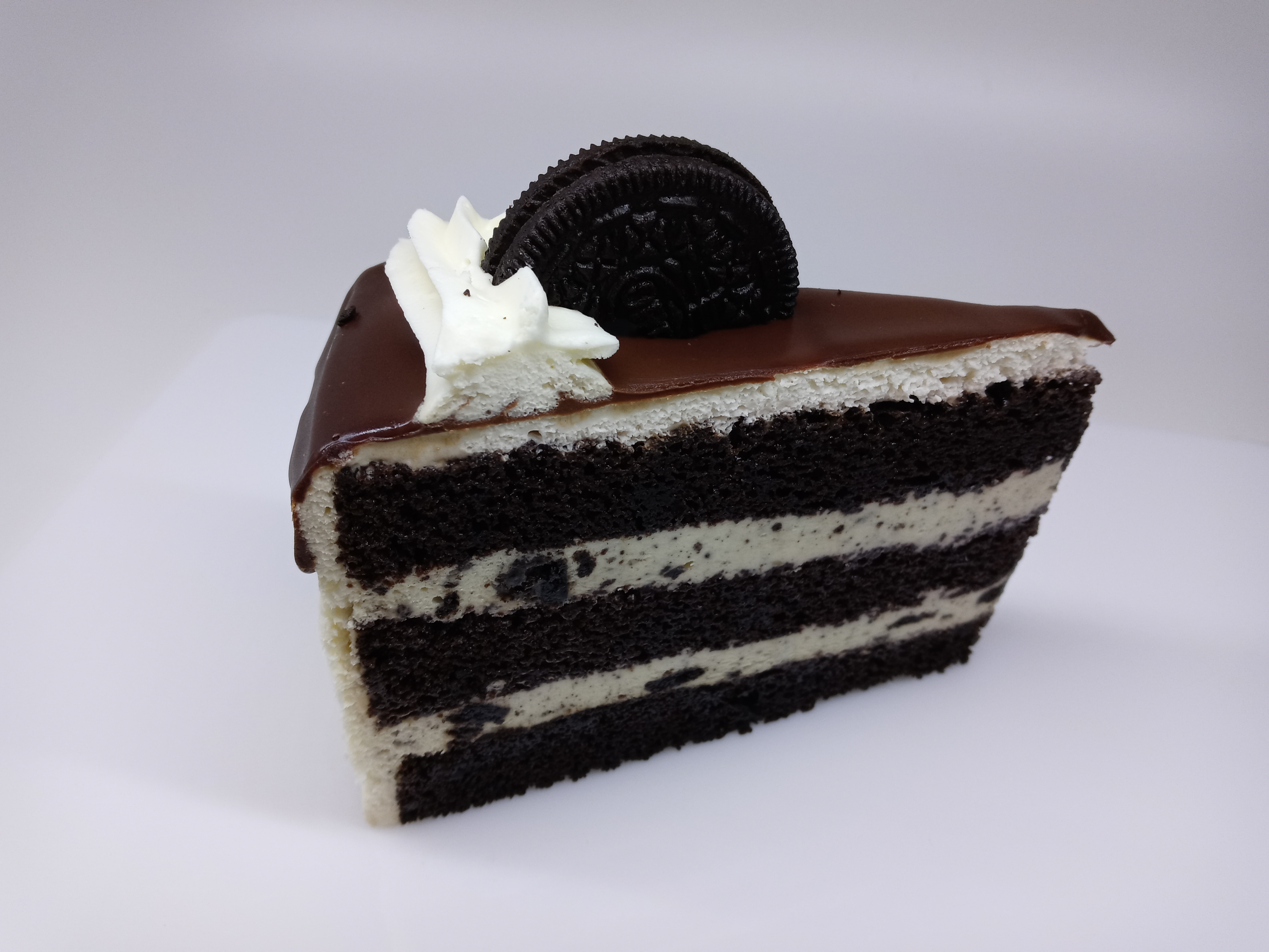 Order OREO LAYER CAKE food online from Wholesome Factory store, New York on bringmethat.com