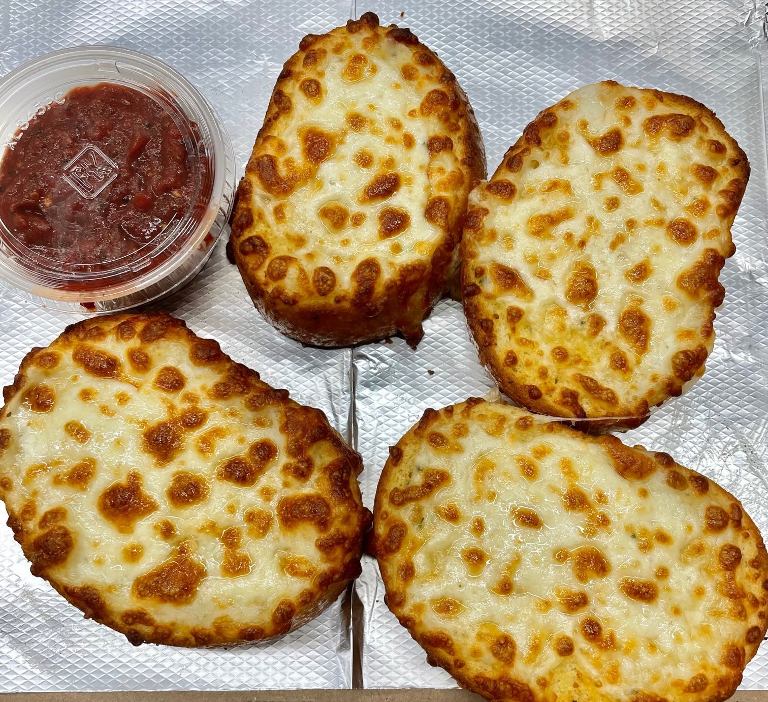 Order Garlic Cheese Toast - 4 Pieces food online from Jimmy's Pizza Litchfield store, Litchfield on bringmethat.com