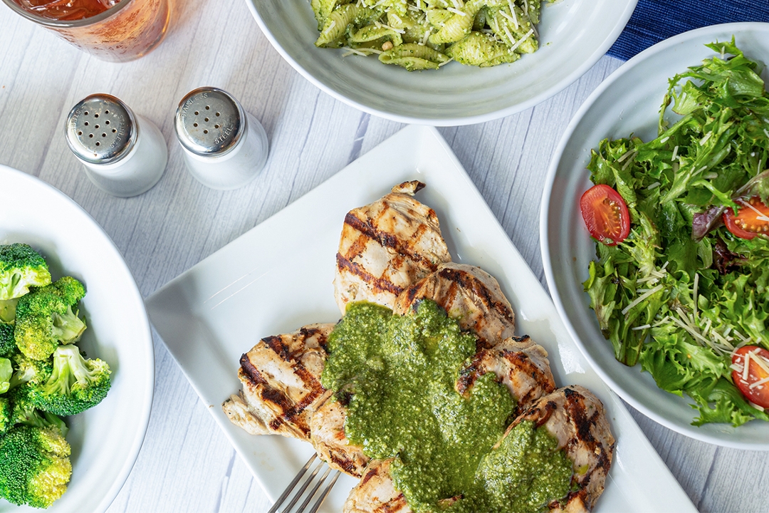 Order Basil Pesto Chicken Family Meal food online from Cafe Express store, Houston on bringmethat.com