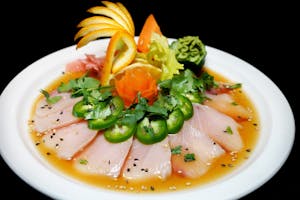 Order Jalapeño Yellowtail Sashimi  (6 Pieces) food online from Stix Restaurant store, Fultondale on bringmethat.com