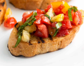 Order Bruschetta food online from Amore Neapolitan Pizzeria at Green Jeans Farmery store, Albuquerque on bringmethat.com