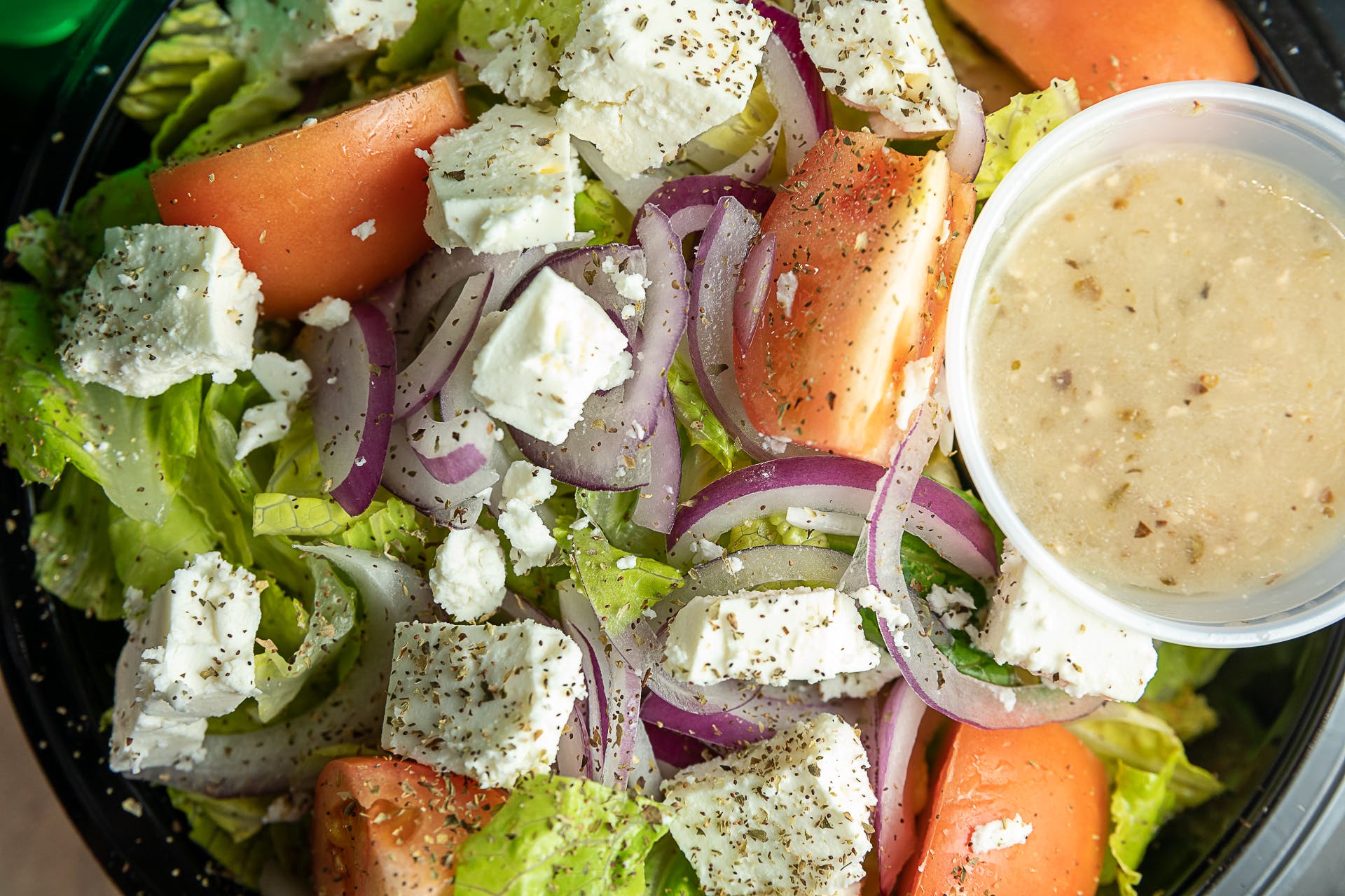 Order Greek Salad - Salad food online from Brick 3 Pizza store, Milwaukee on bringmethat.com