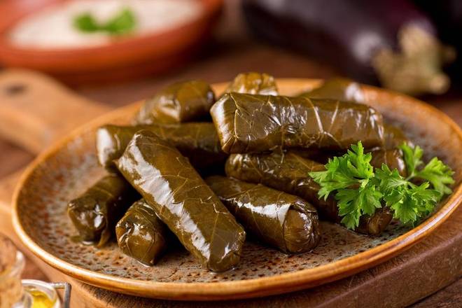 Order Stuffed Grape Leaves (5 Pieces) food online from Kebab Platters store, Clifton on bringmethat.com
