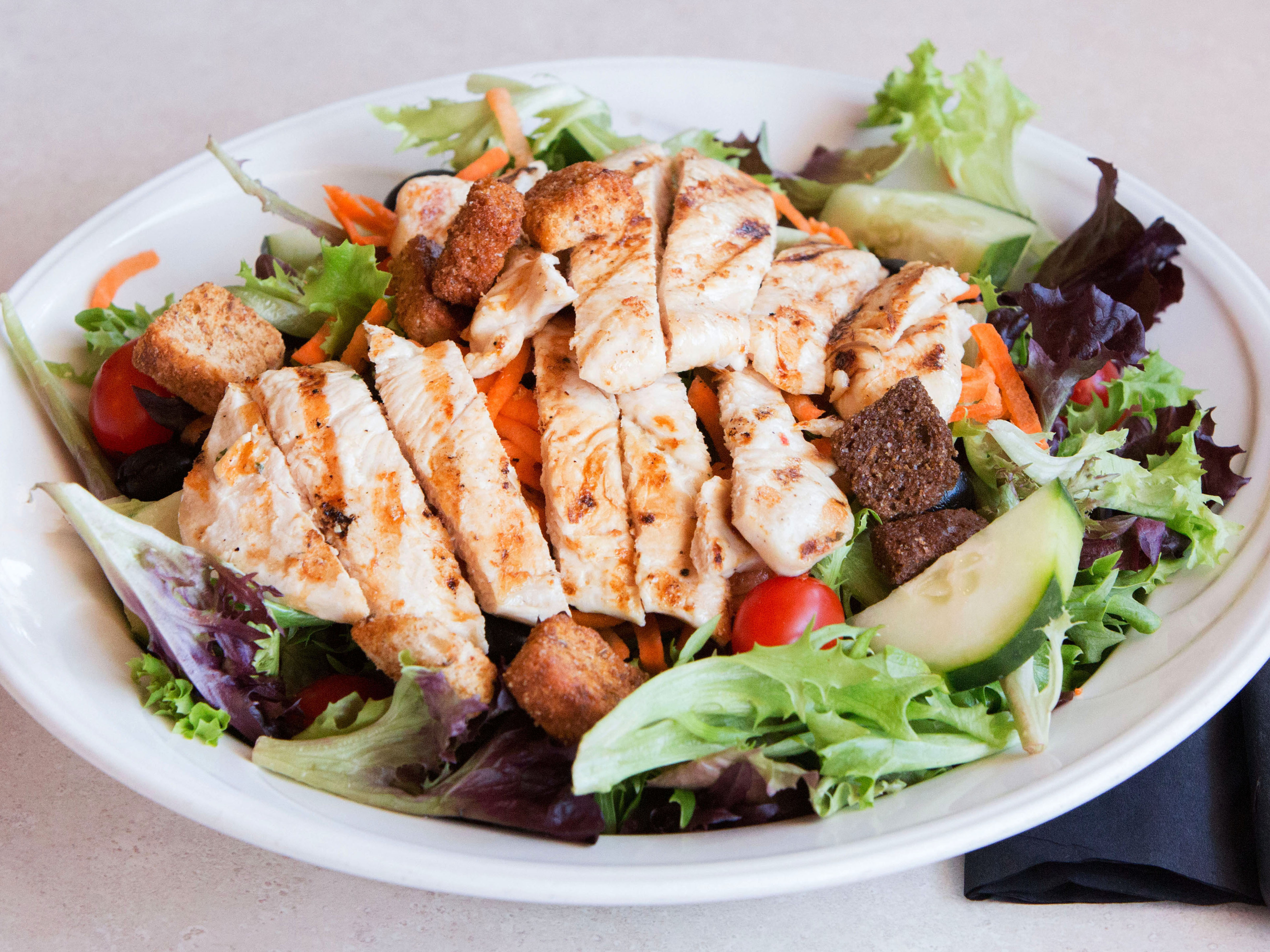 Order Grilled Chicken Salad food online from Giulios Pizza Restaurant store, North Haven on bringmethat.com