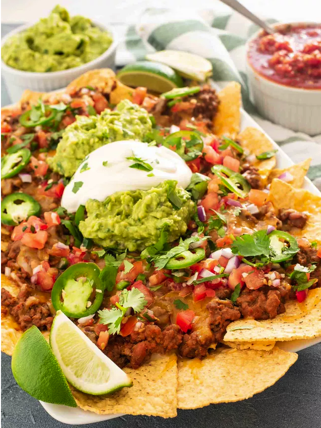 Order NACHOS food online from Latin Quarters store, Norwich on bringmethat.com