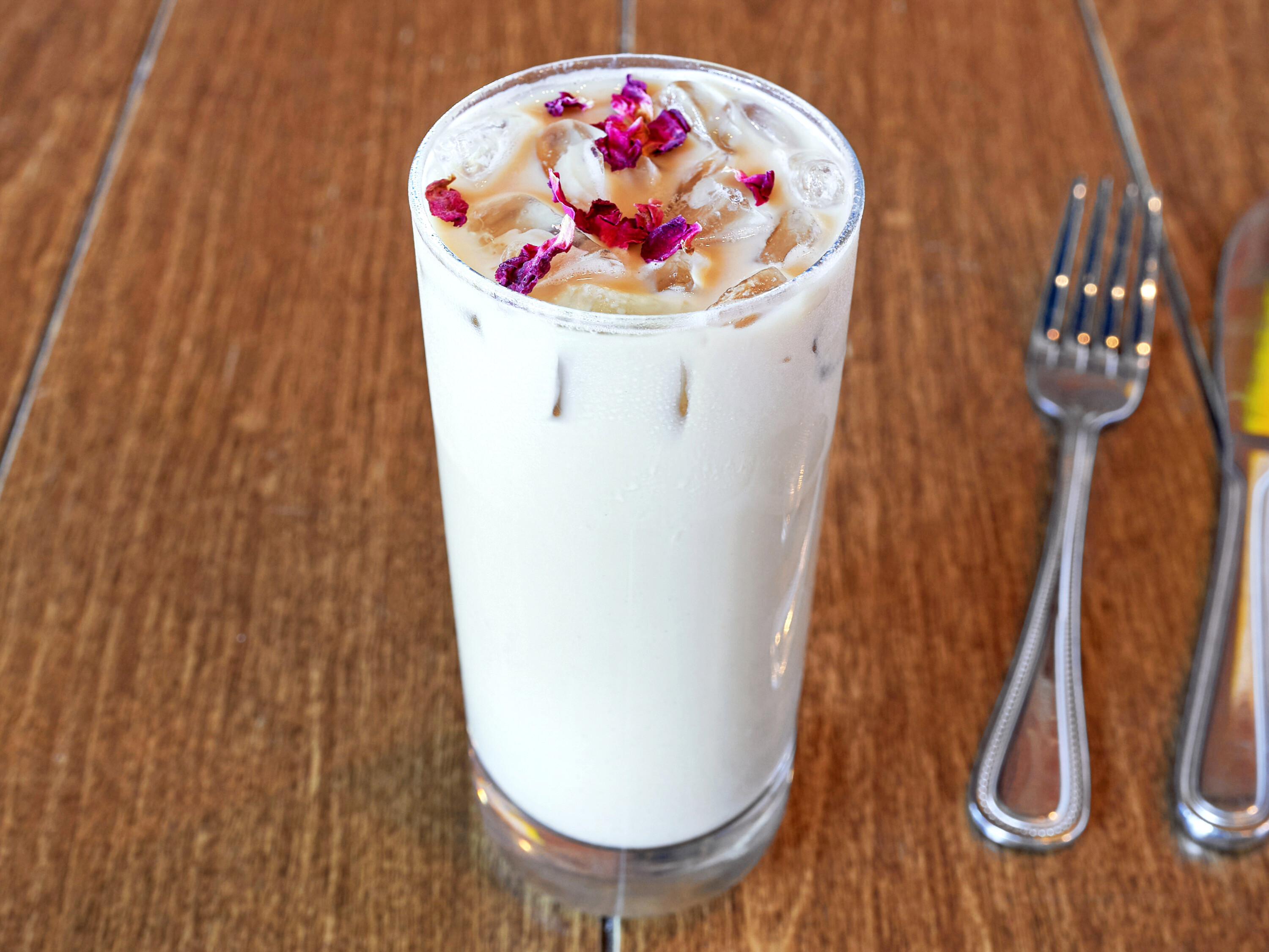 Order Cherry Blossom Iced Latte food online from Press Coffee + Crepes store, Graham on bringmethat.com