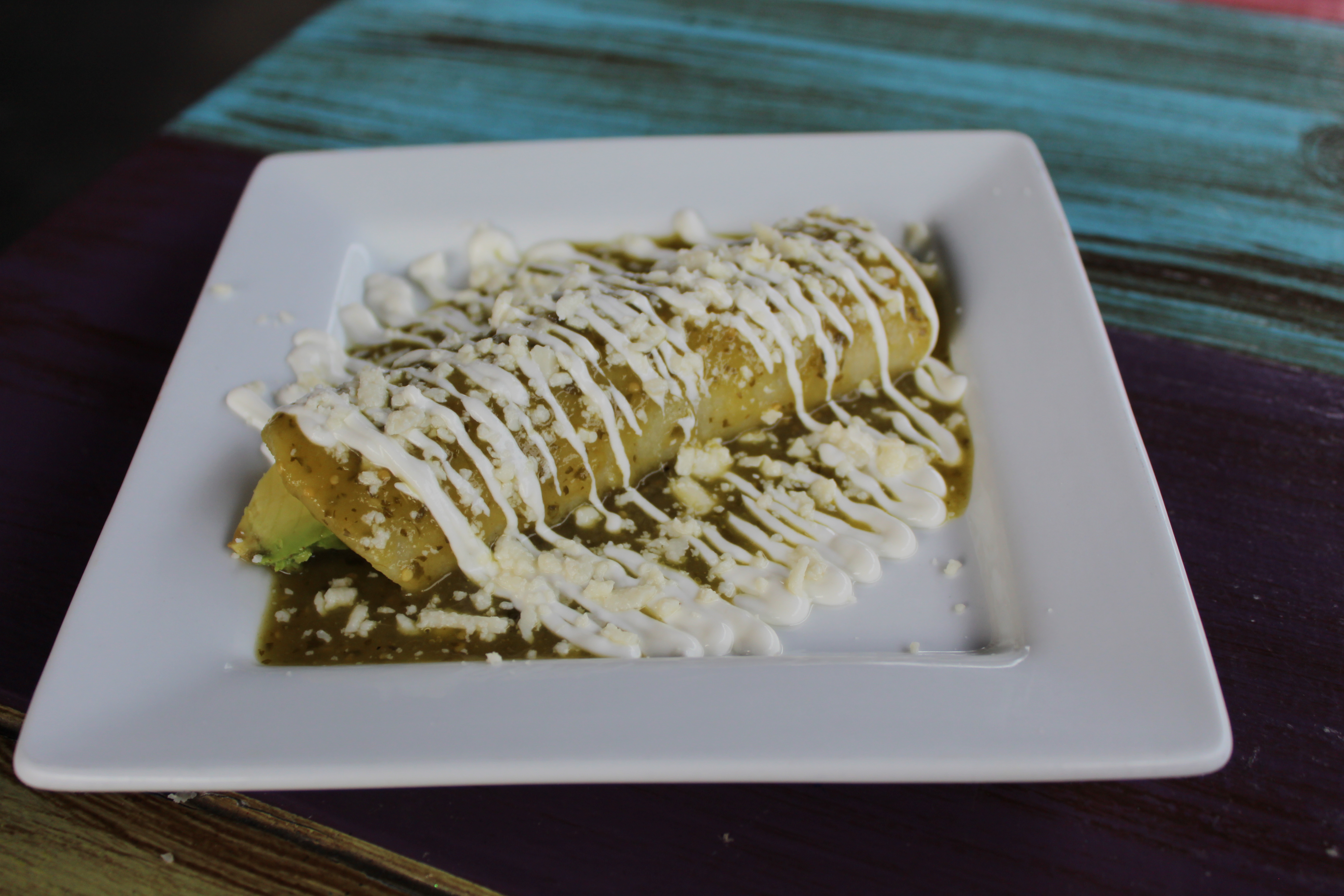 Order Avocado & Cheese Enchilada food online from Cantina Louie store, Asheville on bringmethat.com