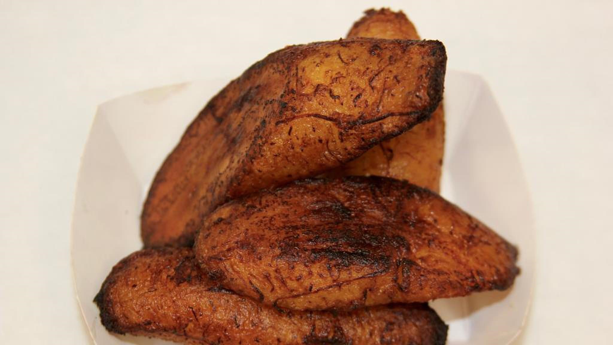 Order Aloko (Sweet Plantains) food online from The Pho store, San Francisco on bringmethat.com