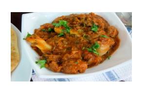 Order Andhra Mutton Curry food online from Biryani Place store, Sandy Springs on bringmethat.com