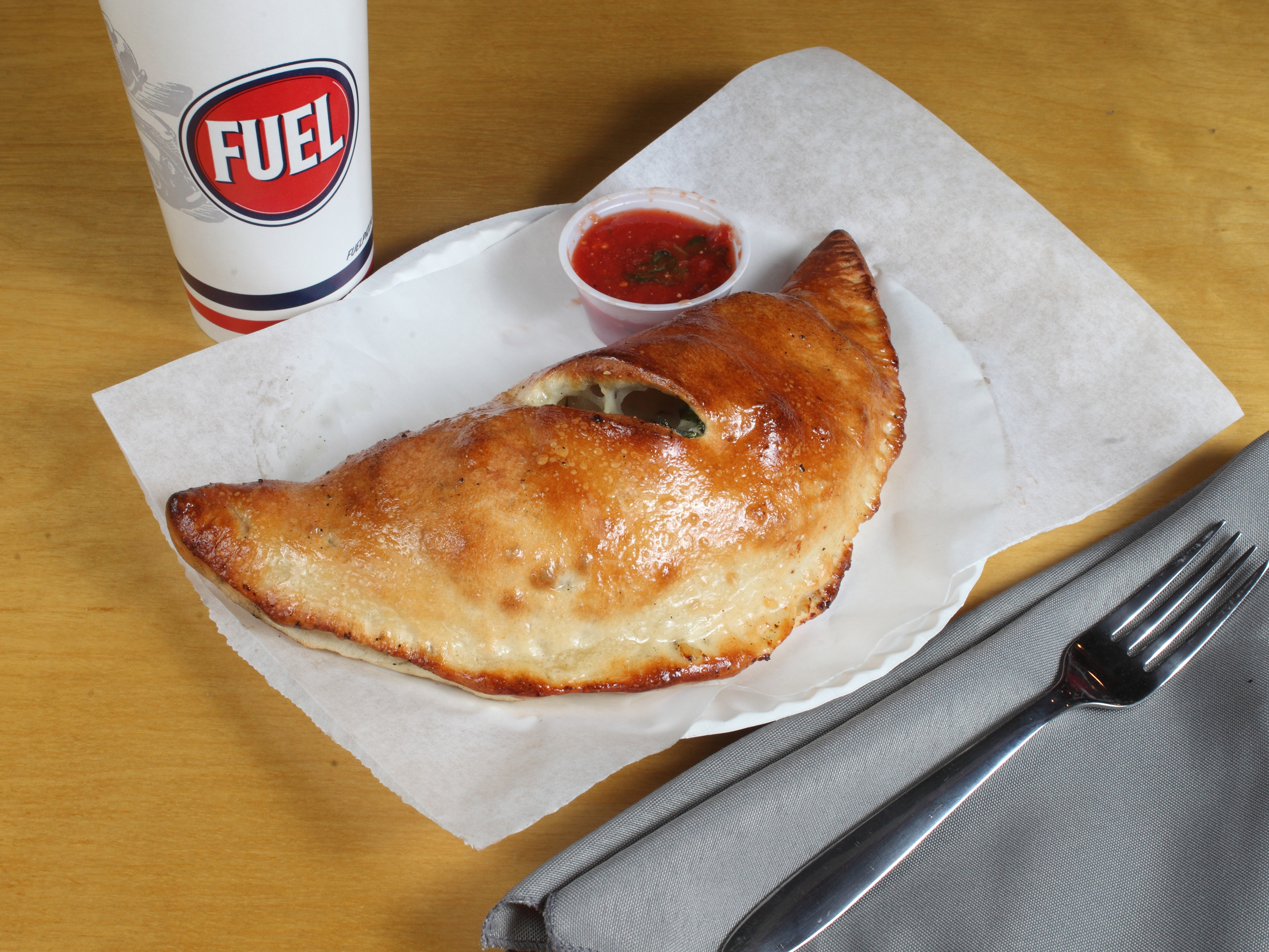 Order Bacon, Spinach, and Tomato Calzone food online from Fuel Pizza store, Charlotte on bringmethat.com