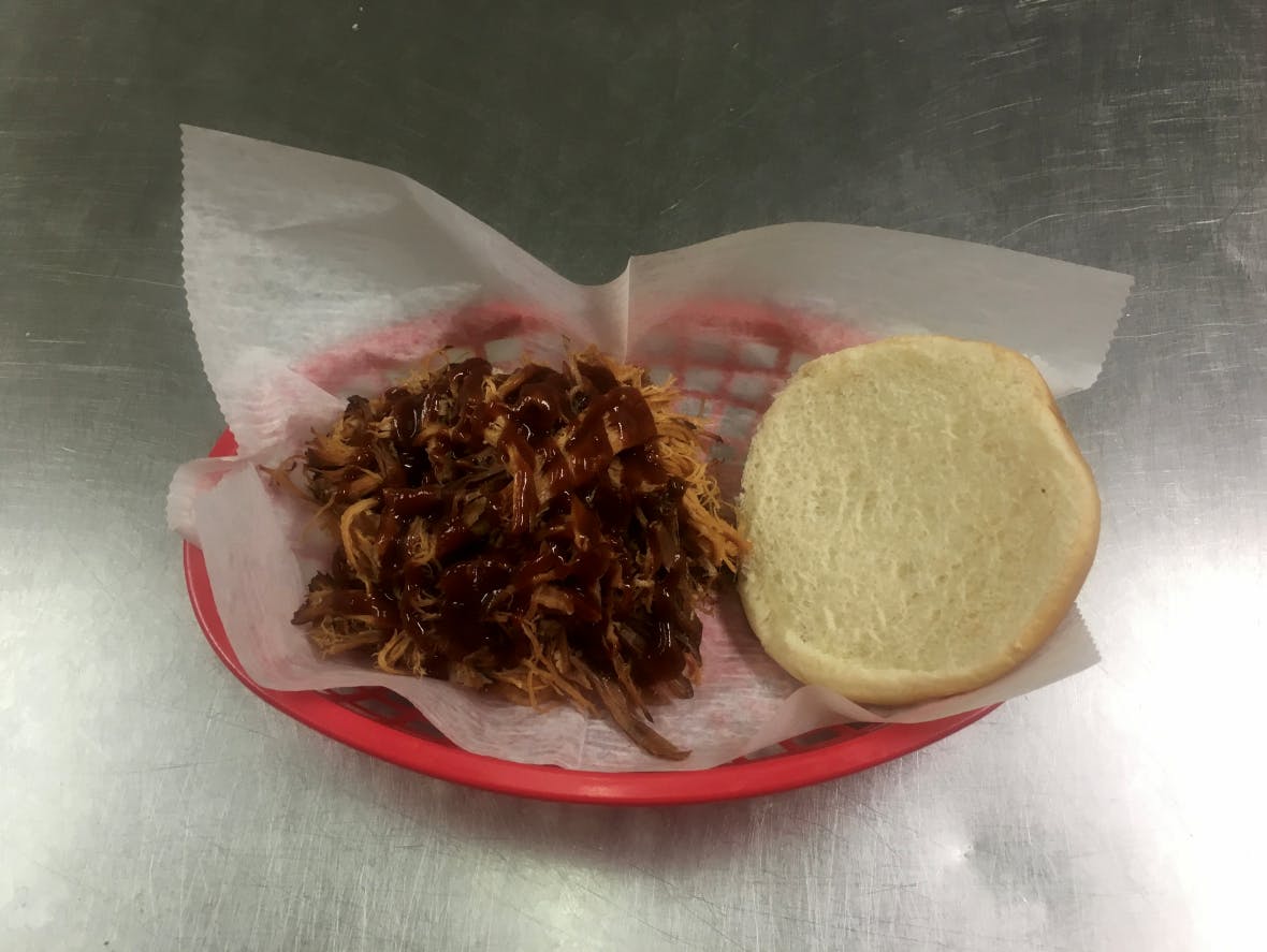 Order BBQ Pulled Pork Sandwich - Sandwich food online from Big D Pizza store, Clyde on bringmethat.com