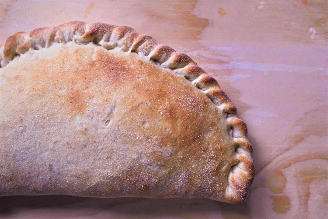 Order Cheese Calzone - Calzone food online from ABC Trattoria & Pizza store, Cromwell on bringmethat.com